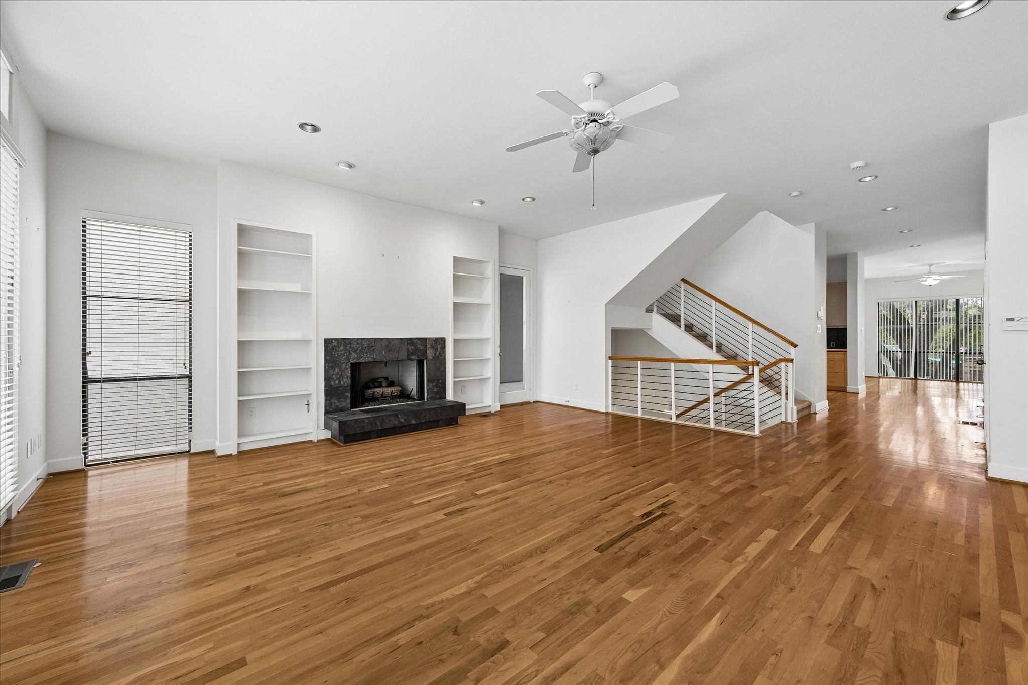 HOW BEAUTIFUL IS THIS.  SPACE, SPACE AND MORE SPACE. COMPLETELY OPEN FOR EASY FLOW TO DINING ROOM.  TO YOUR RIGHT IS YOUR WET BAR AND TO YOUR LEFT IS THE KITCHEN.  SO WELL PLANNED.