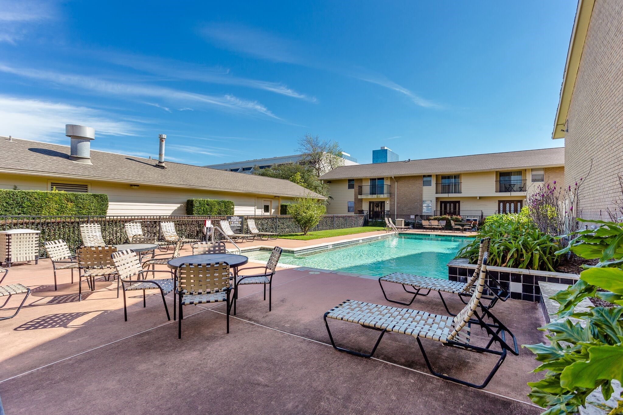 Theres more convenience just steps from the pool! The 1-story building on the opposite side houses the community laundry facility. Toss in a load of laundry, then relax poolside or fire up one of the barbecue grills while you wait. Not a bad way to tackle laundry day!