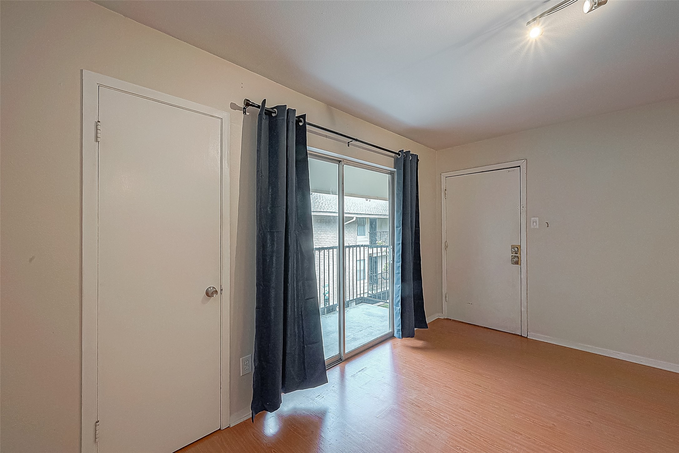 Need extra storage? To the left of the sliding glass door is a LARGE, lighted walk-in storage closetperfect for keeping luggage, seasonal items, household supplies & more tucked neatly out of sight. Need extra storage? To the left of the sliding glass door is a LARGE, lighted walk-in storage closetperfect for keeping luggage, seasonal items, household supplies & more tucked neatly out of sight.