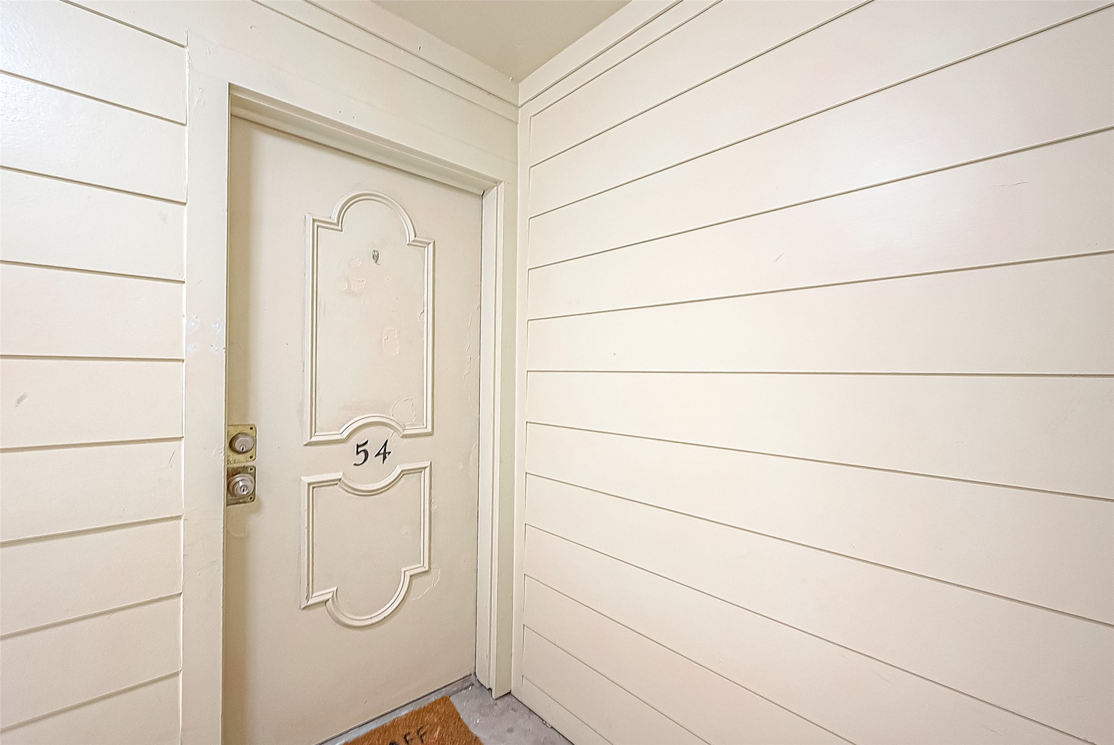 At the top of the stairs, you'll find just two condos. Here we areUnit #54. Let's take a look inside! At the top of the stairs, you'll find just two condos. Here we areUnit #54. Let's take a look inside!