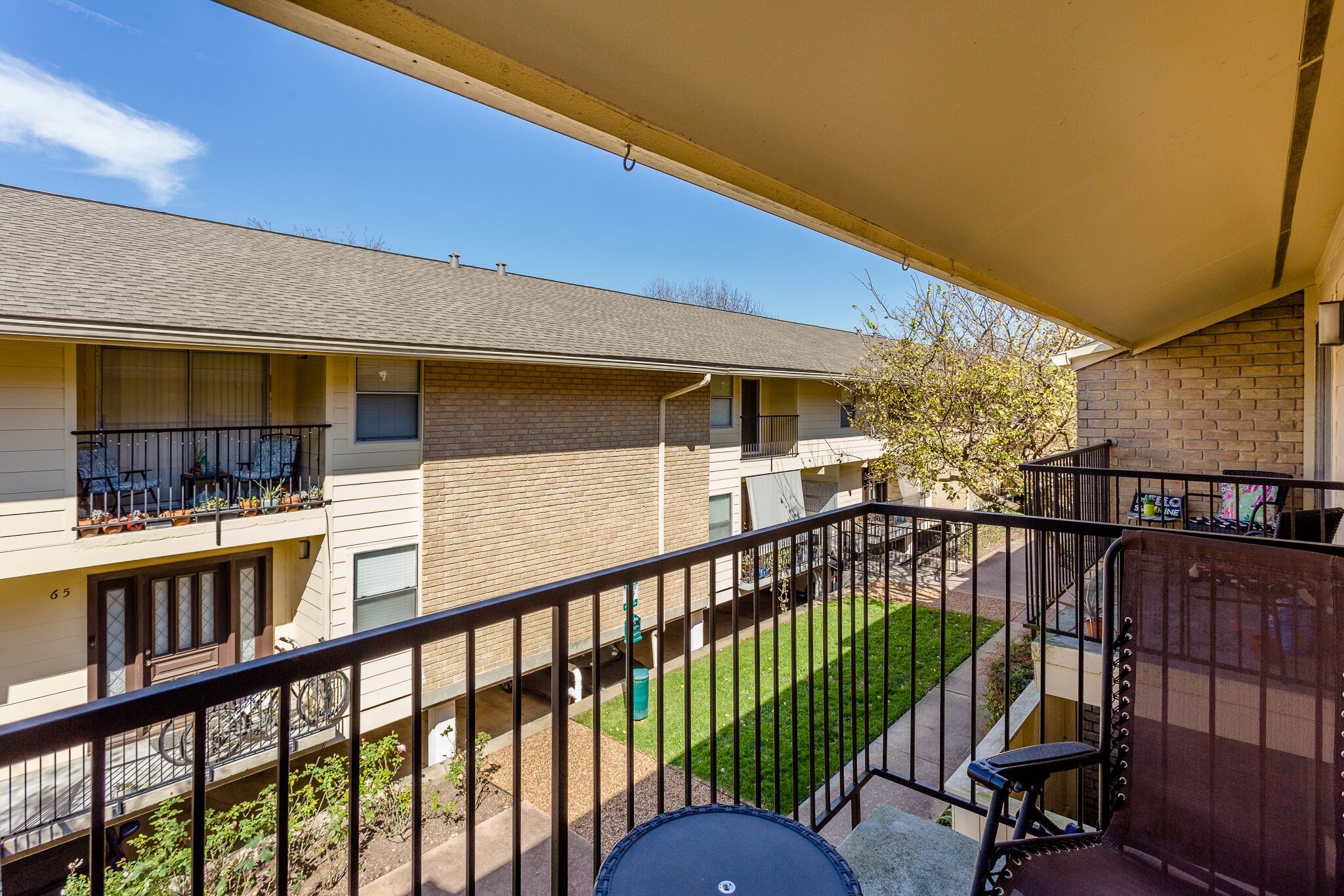Remember that balcony? Here it is! Step outside from the living room to your 2nd-floor balcony overlooking the landscaped courtyard below. Theres room for a couple of chairs & a small tablean inviting spot to enjoy your morning coffee, catch up on a good book, or simply get a little fresh air.
