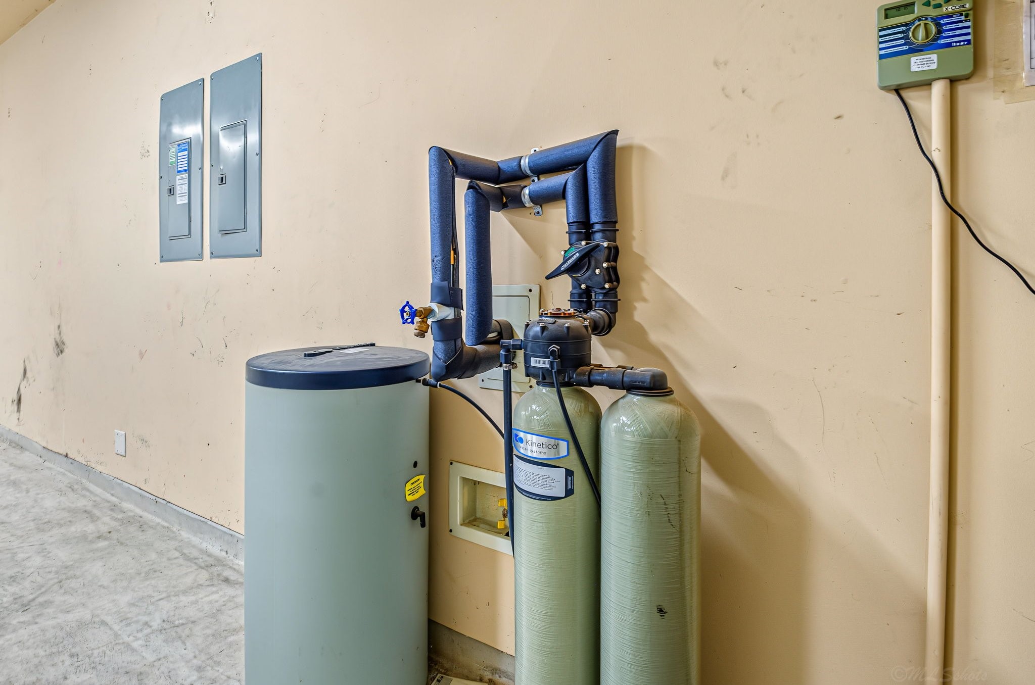 This whole house water softening system stays with the house! (SCORE!)