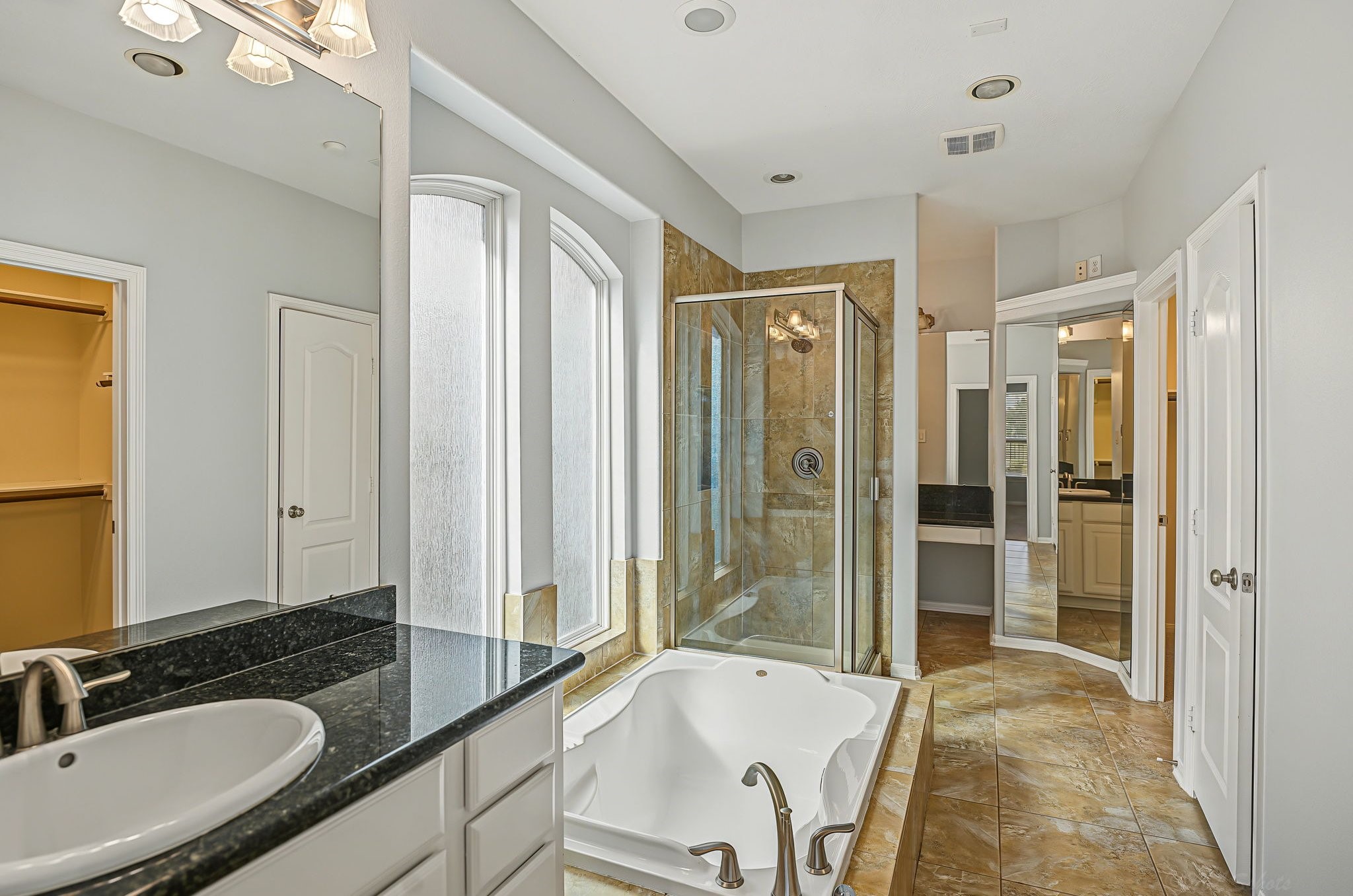 This is 'classic' Trendmaker. Look at that tub, deep and long! Separate large stand-up shower and the large closet at the end! 3-way mirror to check your outfit!