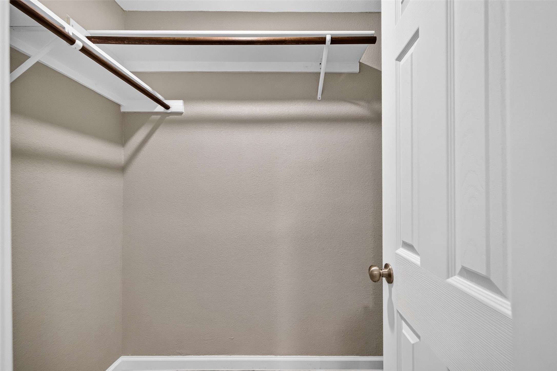 Closet in primary bathroom