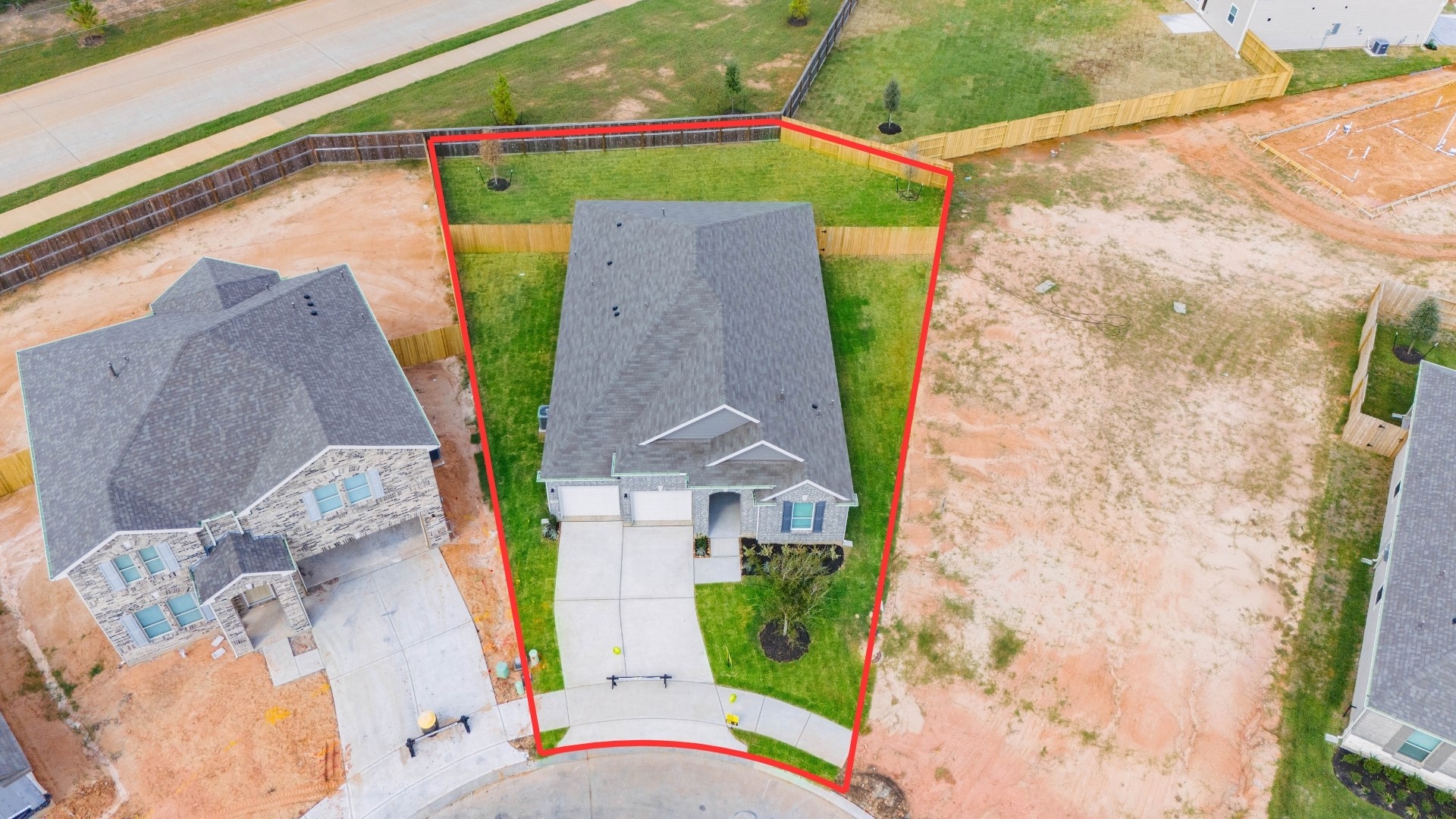 Amazing aerial shot of this gorgeous KB home situated on a large lot with NO BACK NEIGHBORS with lush landscaping and well manicured lawn.