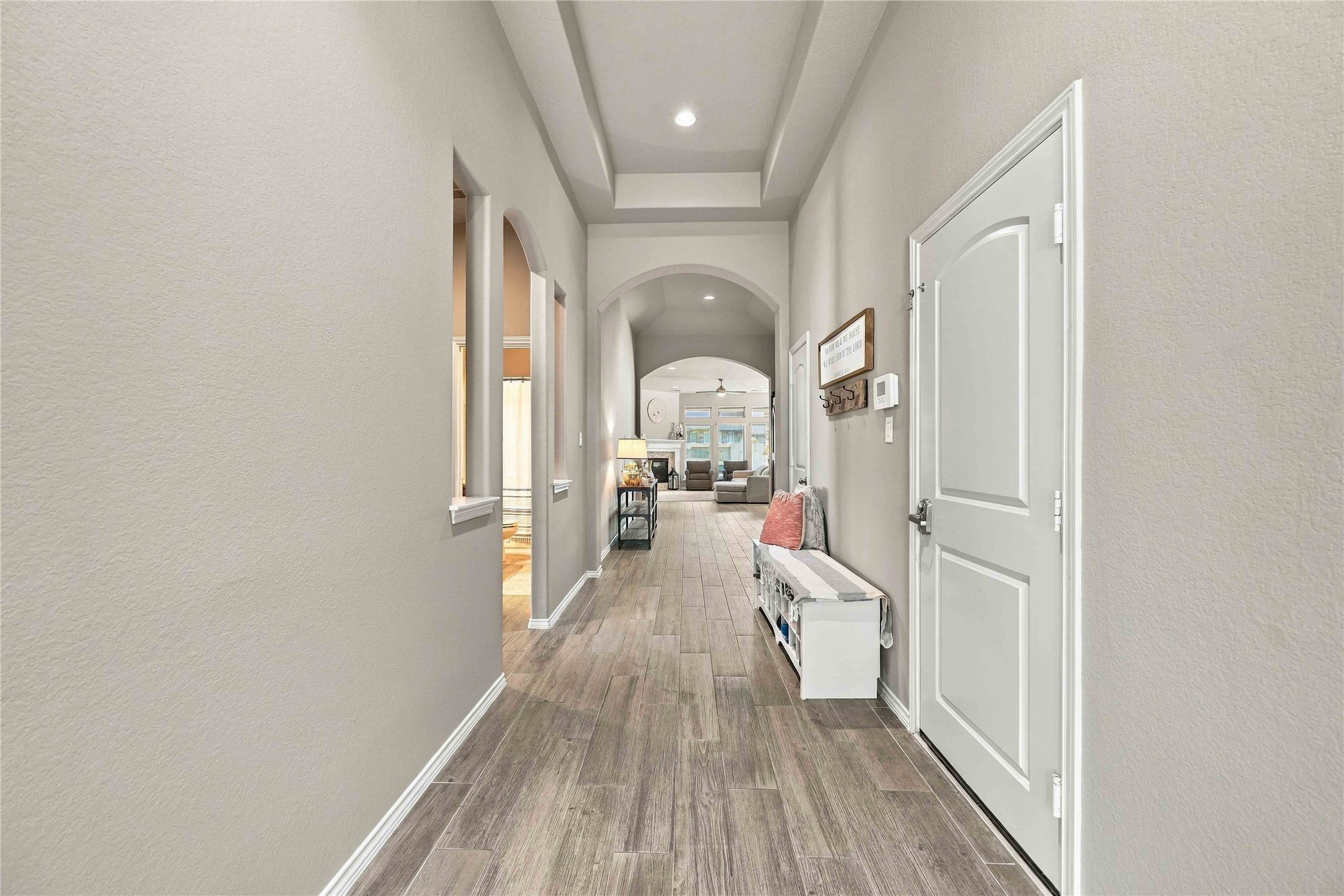 A welcoming entryway with high ceilings. A welcoming entryway with high ceilings.