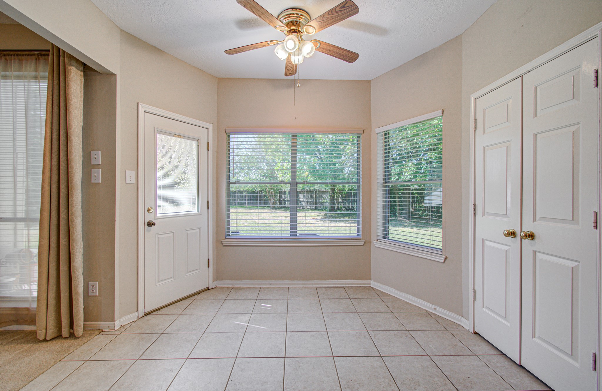 1. Start your day with a view! Bright breakfast area offers space for everyday meals while enjoying views of the expansive backyard.