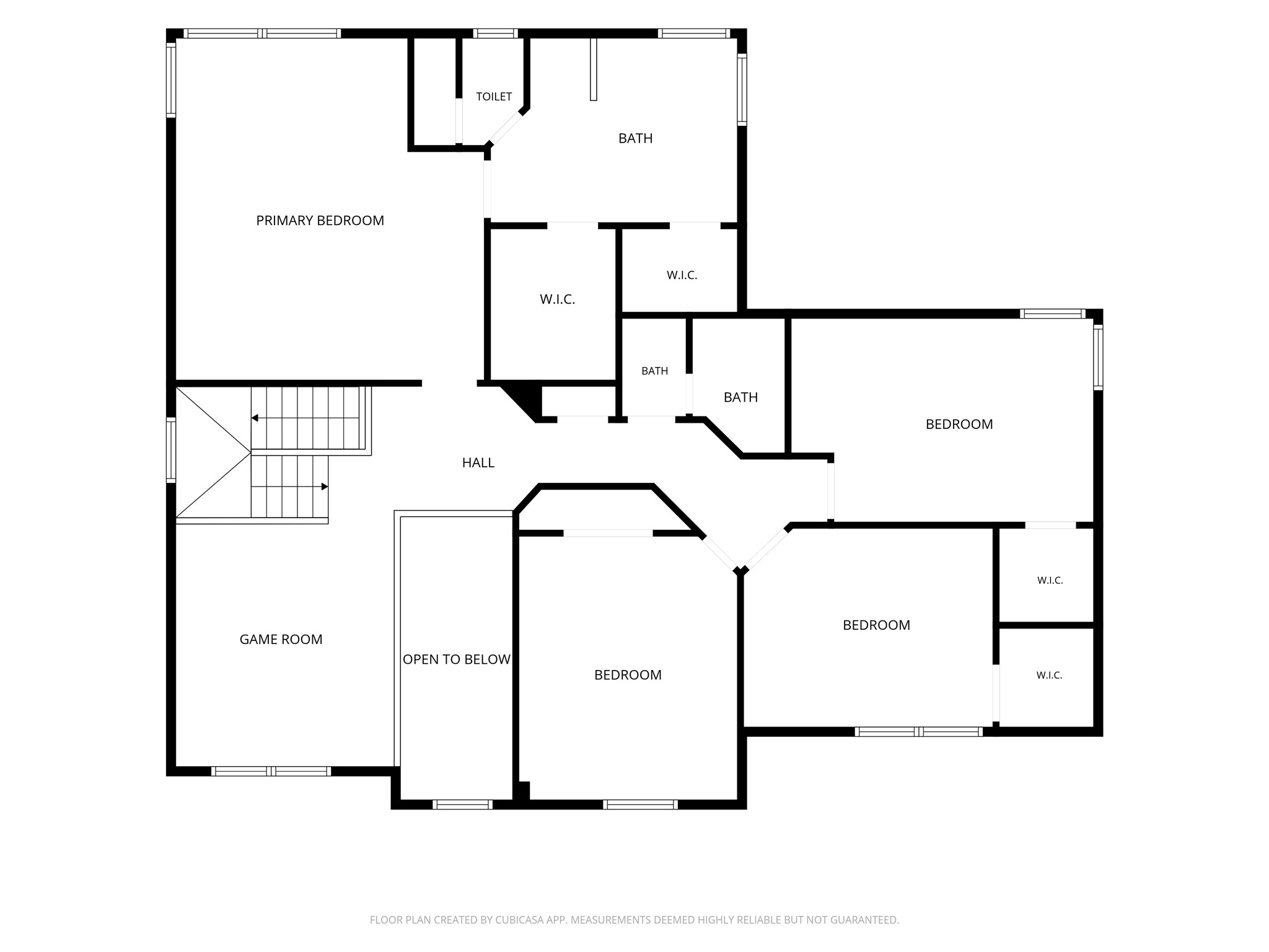 Upstairs are the spacious primary suite, three secondary bedrooms and a game room.