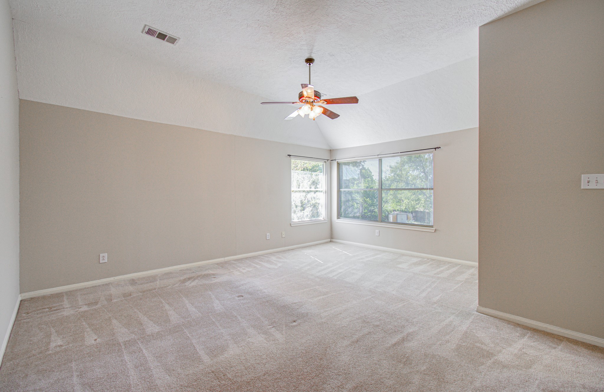 Your own private retreat! Generously sized primary bedroom features multiple windows and direct access to a large ensuite bath.