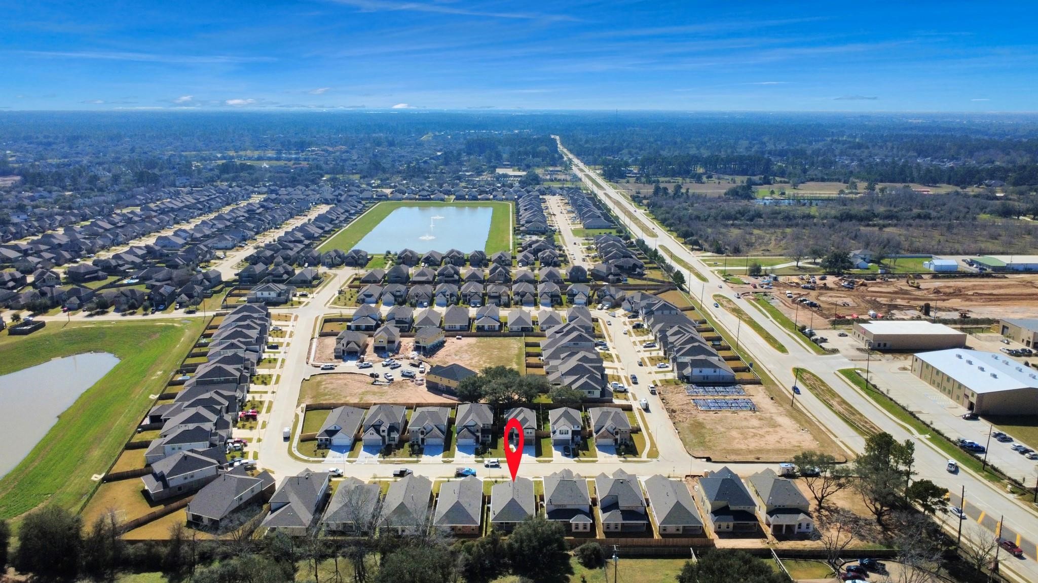 Charming suburban neighborhood with neatly arranged homes and nearby green spaces, offering a serene and family-friendly environment.