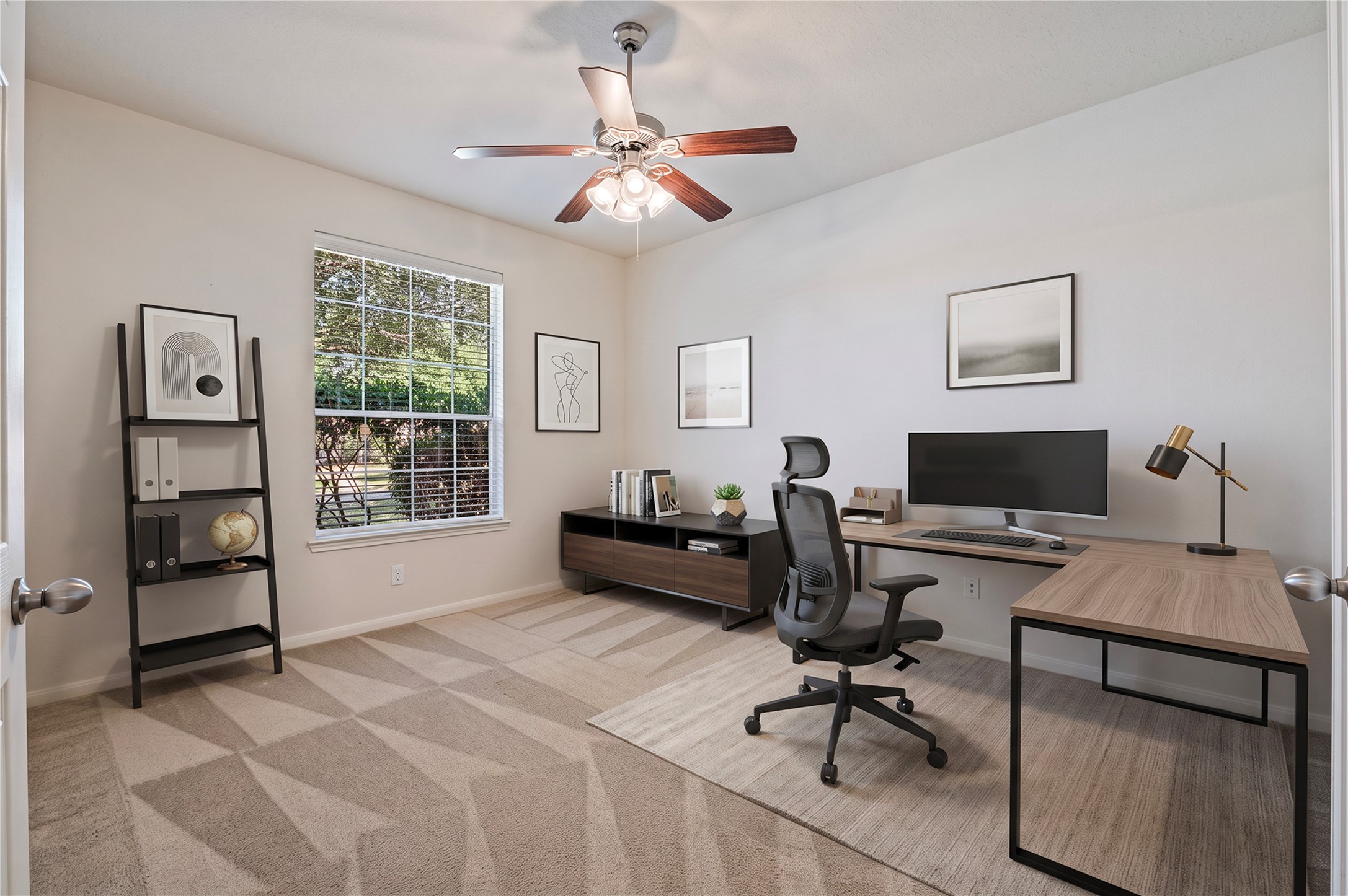 A private home office/study with double doors and a ceiling fan, ideal for working from home. Room is virtually staged.