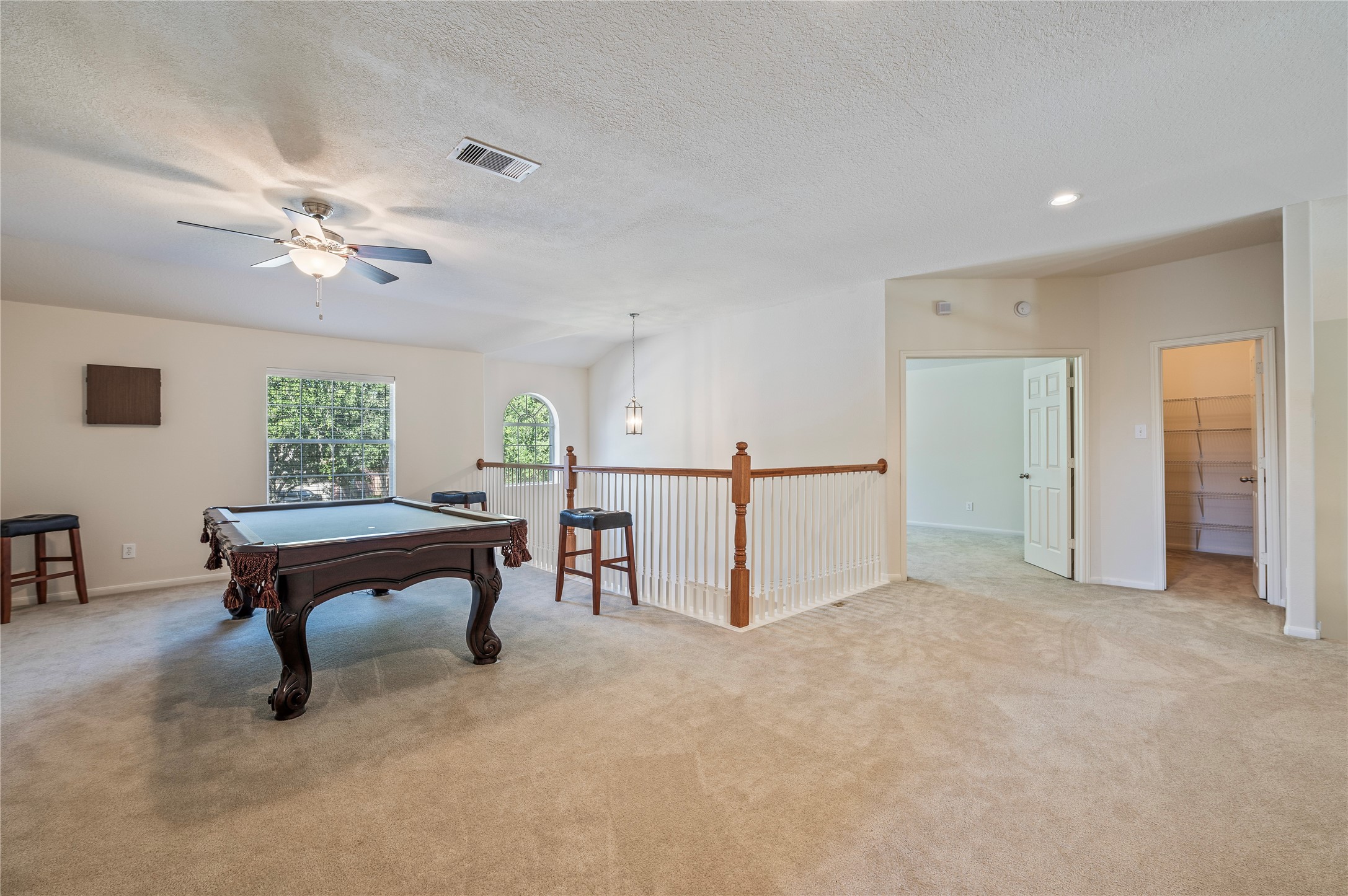 Another view of the huge upstairs game room, with room for a pool table, gaming, hobbies and more.