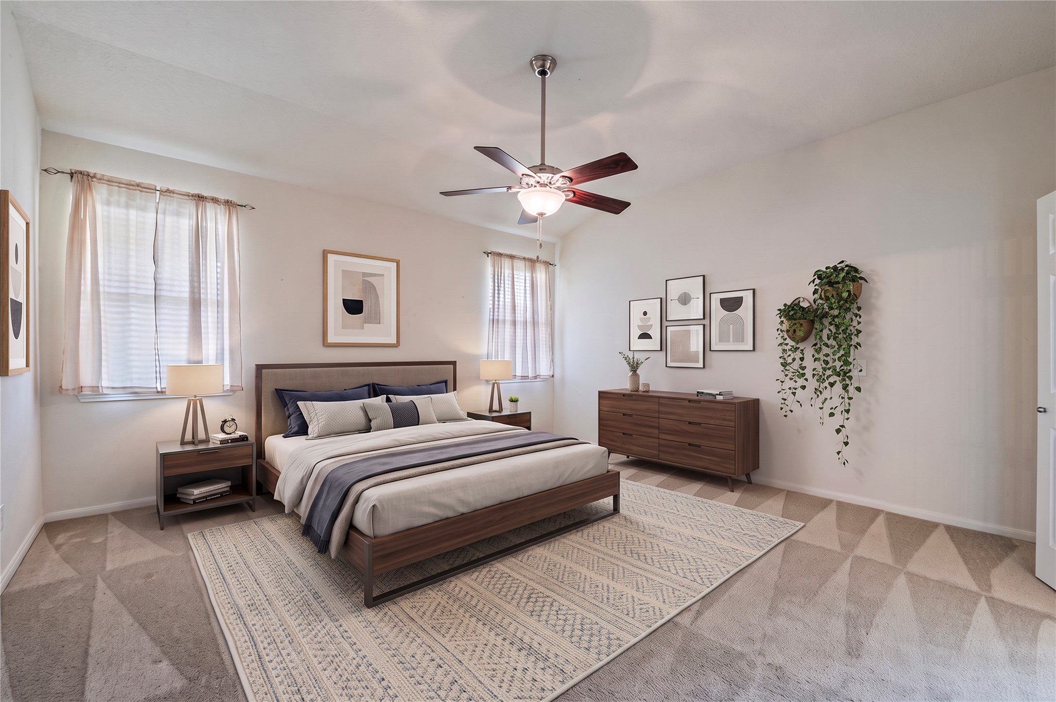 The generous primary suite is on the first floor, with high ceilings and views of the backyard. Room is virtually staged.