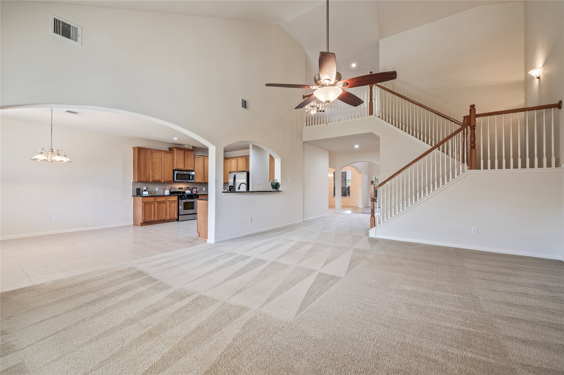 The family room opens directly to the breakfast area and kitchen, an easy layout for everyday living and entertaining.