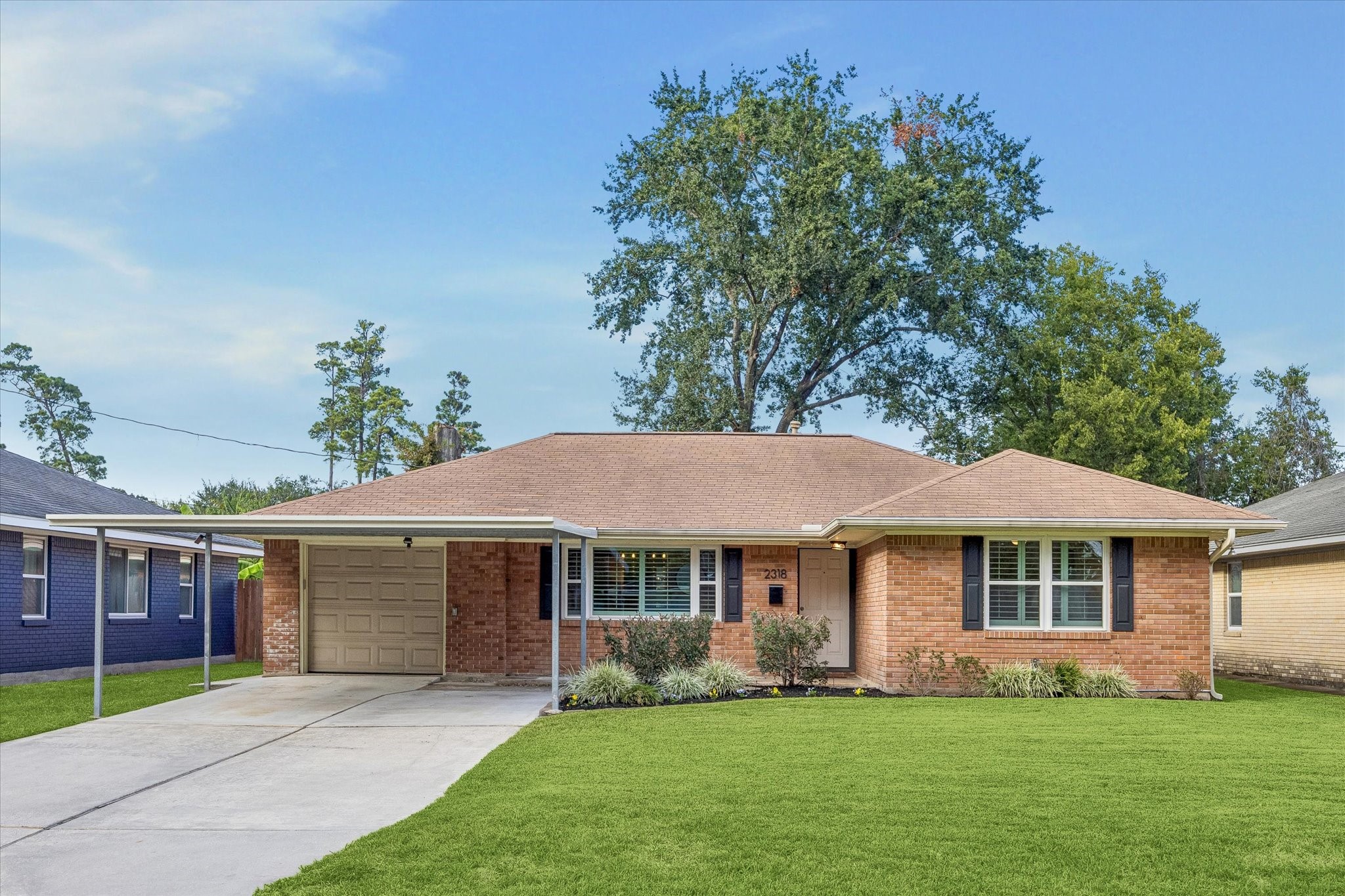 Classic brick exterior, a broad front lawn and a mature tree create inviting Oak Forest curb appeal. A substantially redone 2 car driveway, carport and 1 car garage provide convenient parking options for everyday arrivals and visitors. Classic brick exterior, a broad front lawn and a mature tree create inviting Oak Forest curb appeal. A substantially redone 2 car driveway, carport and 1 car garage provide convenient parking options for everyday arrivals and visitors.