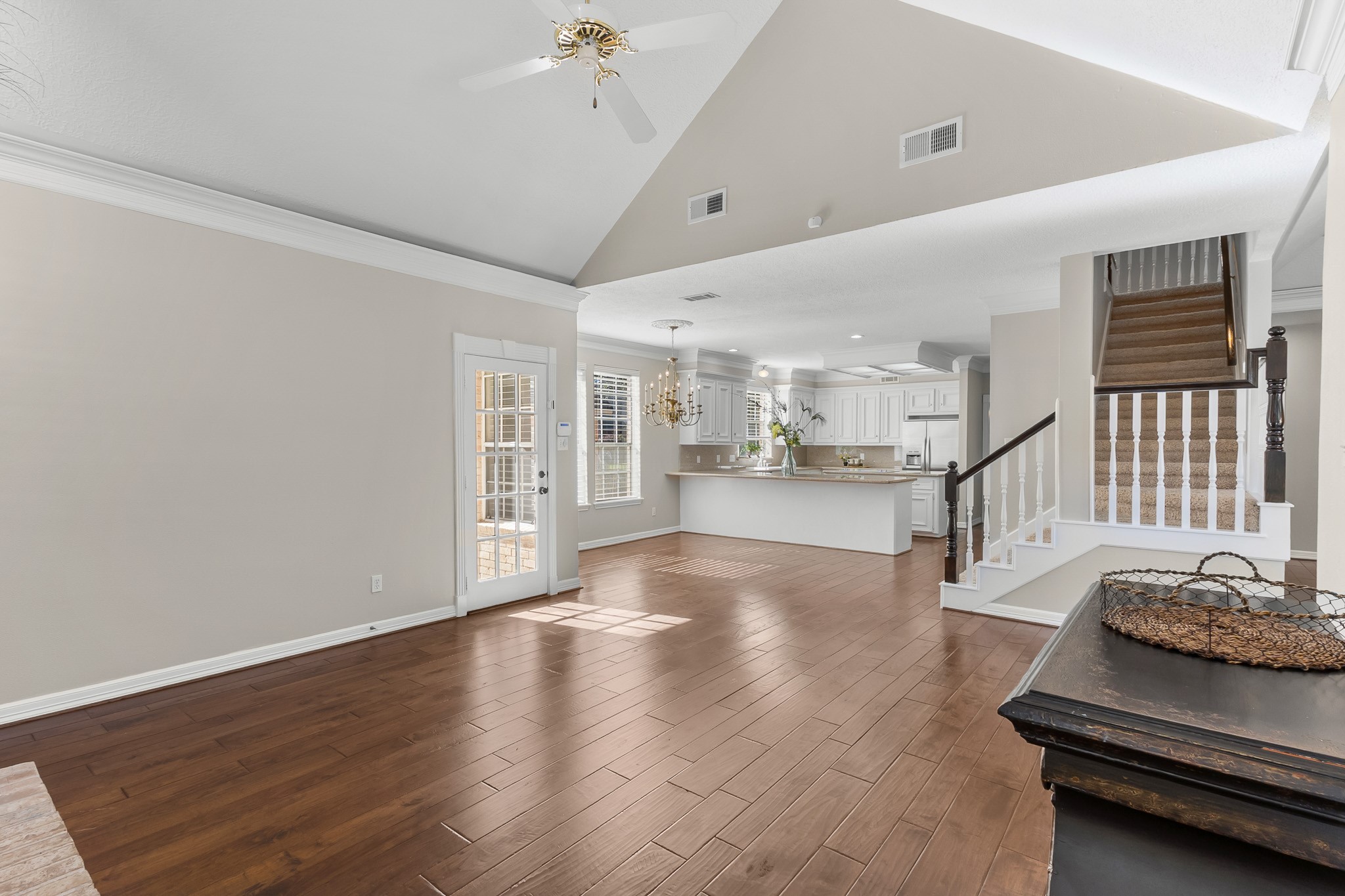 Generous proportions, refined crown molding and warm wood floors create a versatile setting for conversation or quiet relaxation.