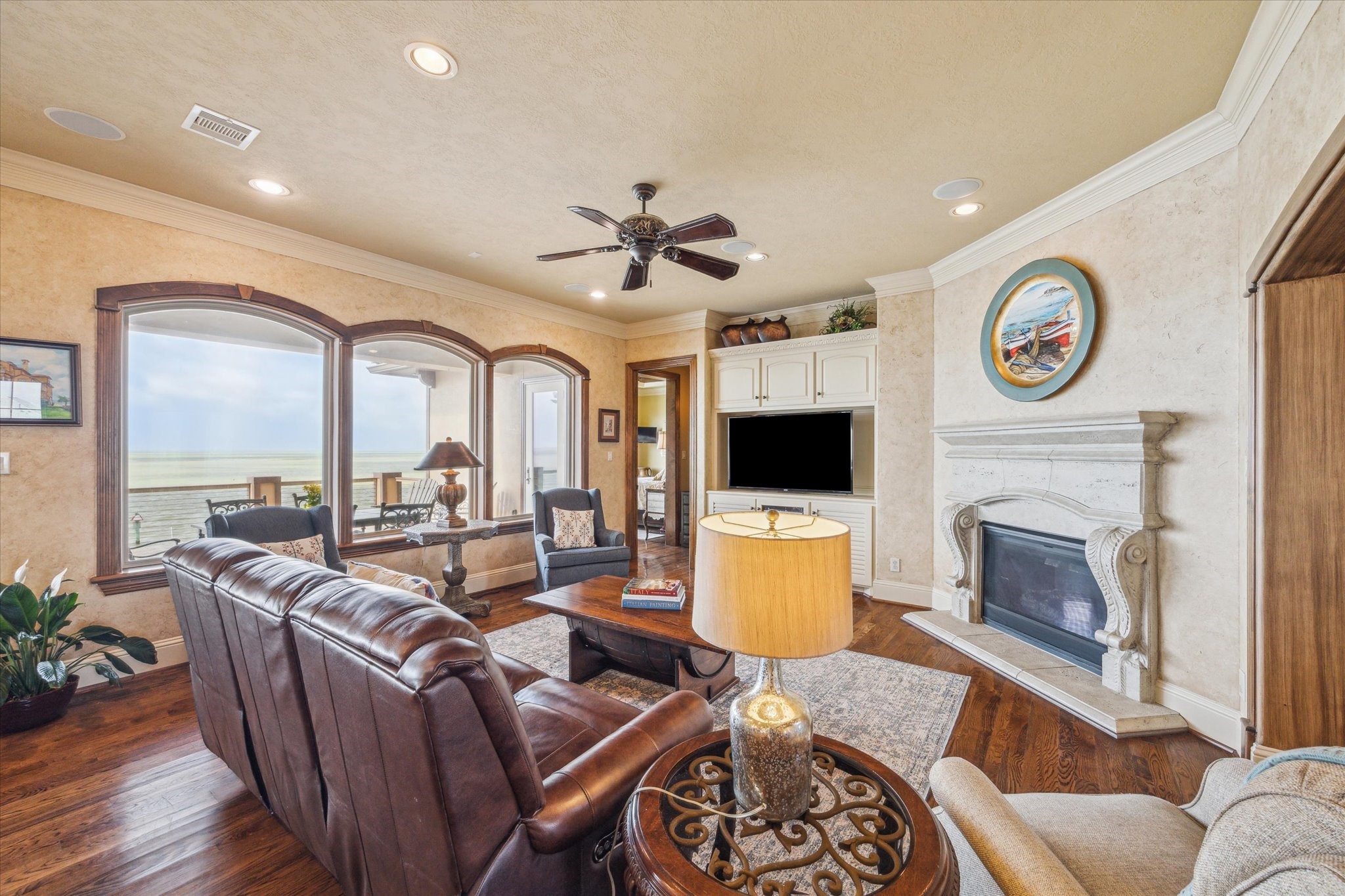 A welcoming living area with the perfect flow for entertaining & a relaxed setting with amazing bay views. Home includes 2 Rinnai R94 tankless water heaters with circulation pump A welcoming living area with the perfect flow for entertaining & a relaxed setting with amazing bay views. Home includes 2 Rinnai R94 tankless water heaters with circulation pump