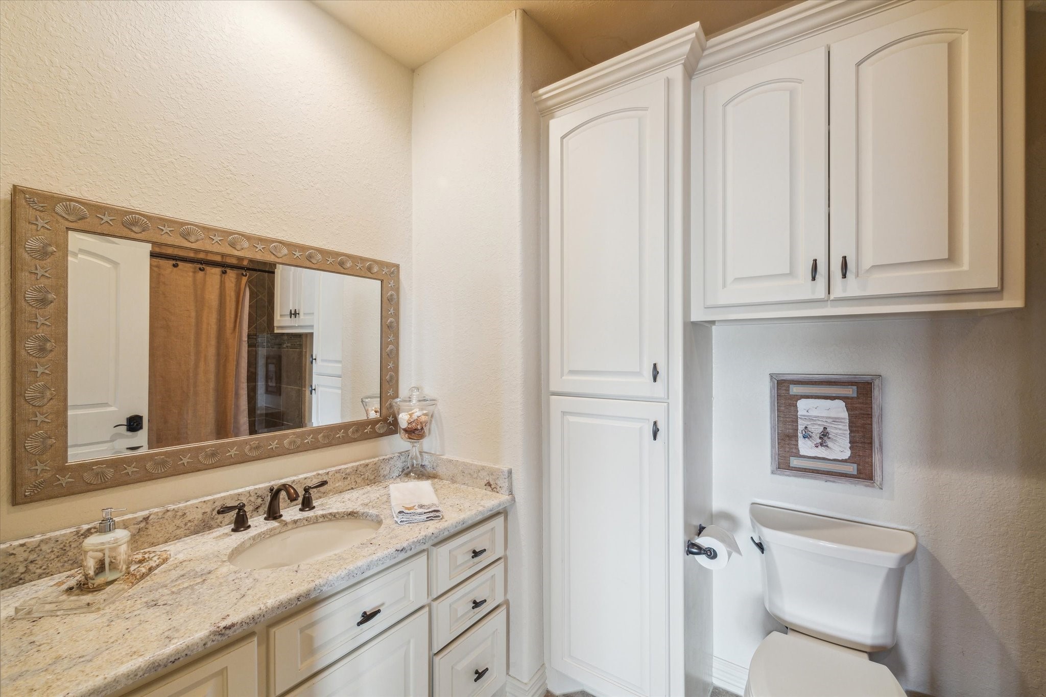 One of three guest bathrooms