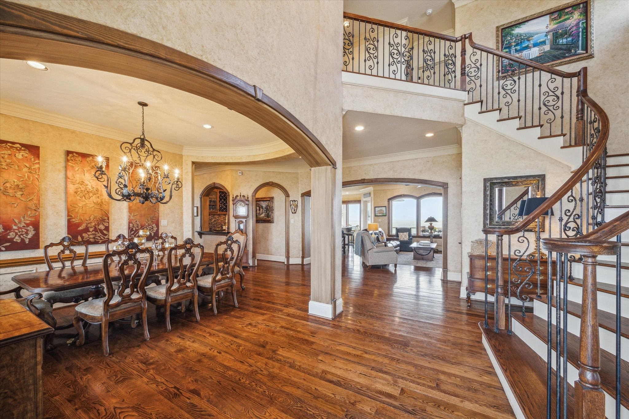 An inviting entrance with a warm embrace opens to walls of windows with instant views of the bay. Home includes 8 triple lock, high impact exterior Neuma doors An inviting entrance with a warm embrace opens to walls of windows with instant views of the bay. Home includes 8 triple lock, high impact exterior Neuma doors