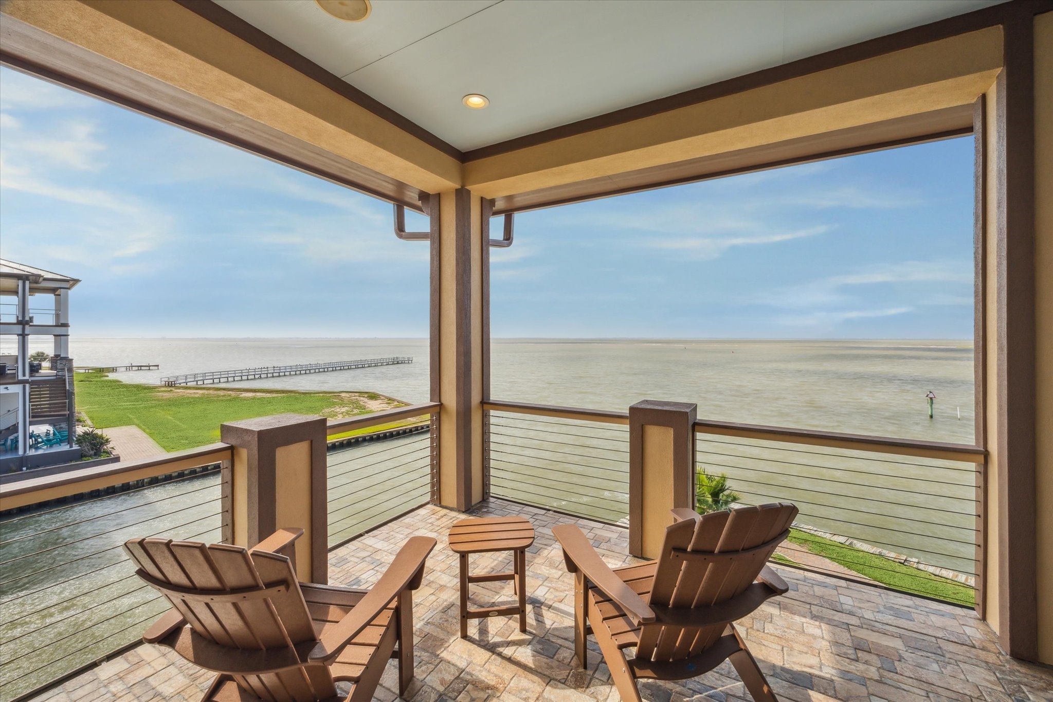 Tile flooring on covered decks on main living level and upper level...Just look at those views!