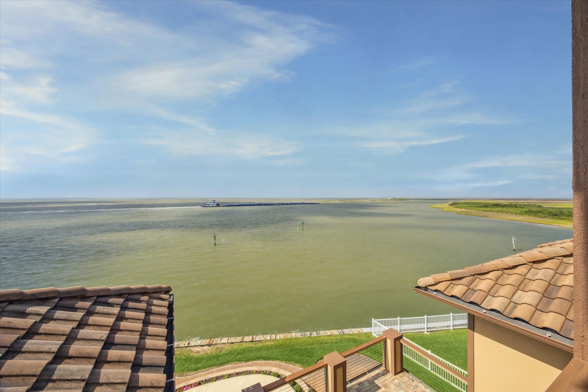 Direct deep water access to the Intracoastal Waterway. Generac 36 kw whole house stand-by generator covers all circuits
including pool equipment and boat house; entire system (including
transfer switch) is mounted on a raised platform 25 foot above mean tide
level