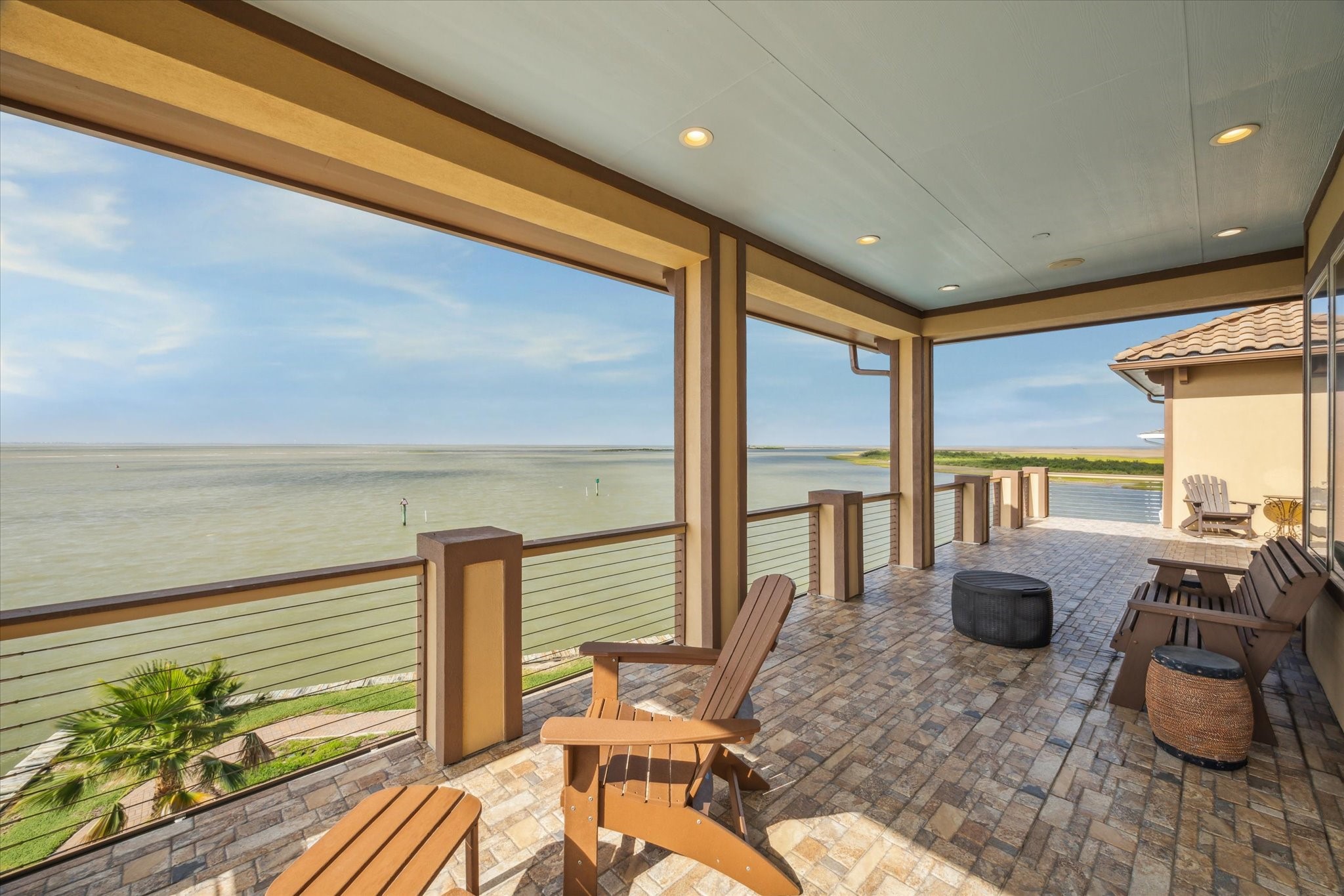 Upper level balcony overlooking West Galveston Bay, accessible by 2 of
the upper level bedrooms