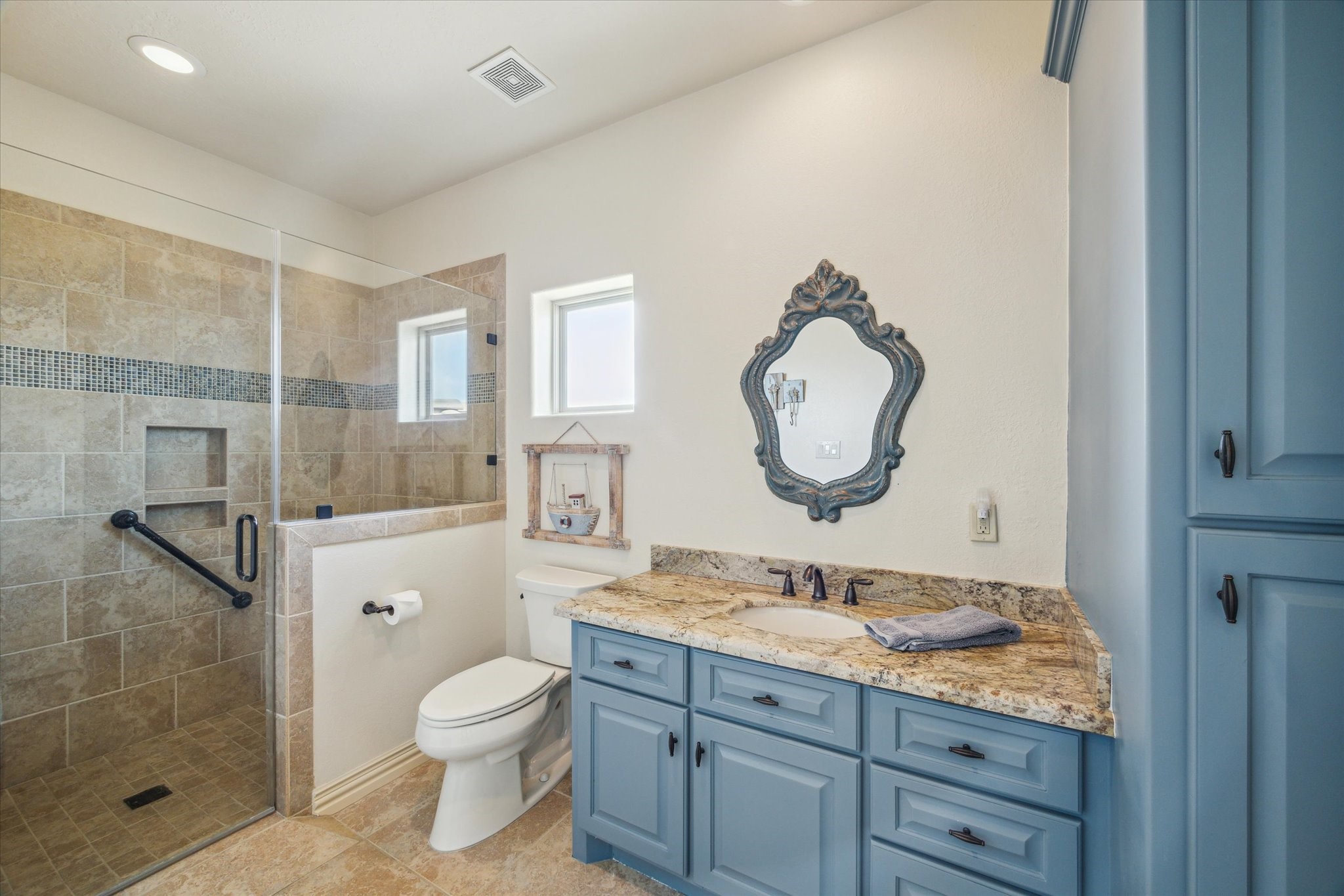 The home offers four full-size bathrooms, including one that is thoughtfully designed to be handicapped accessibleensuring comfort and convenience for all