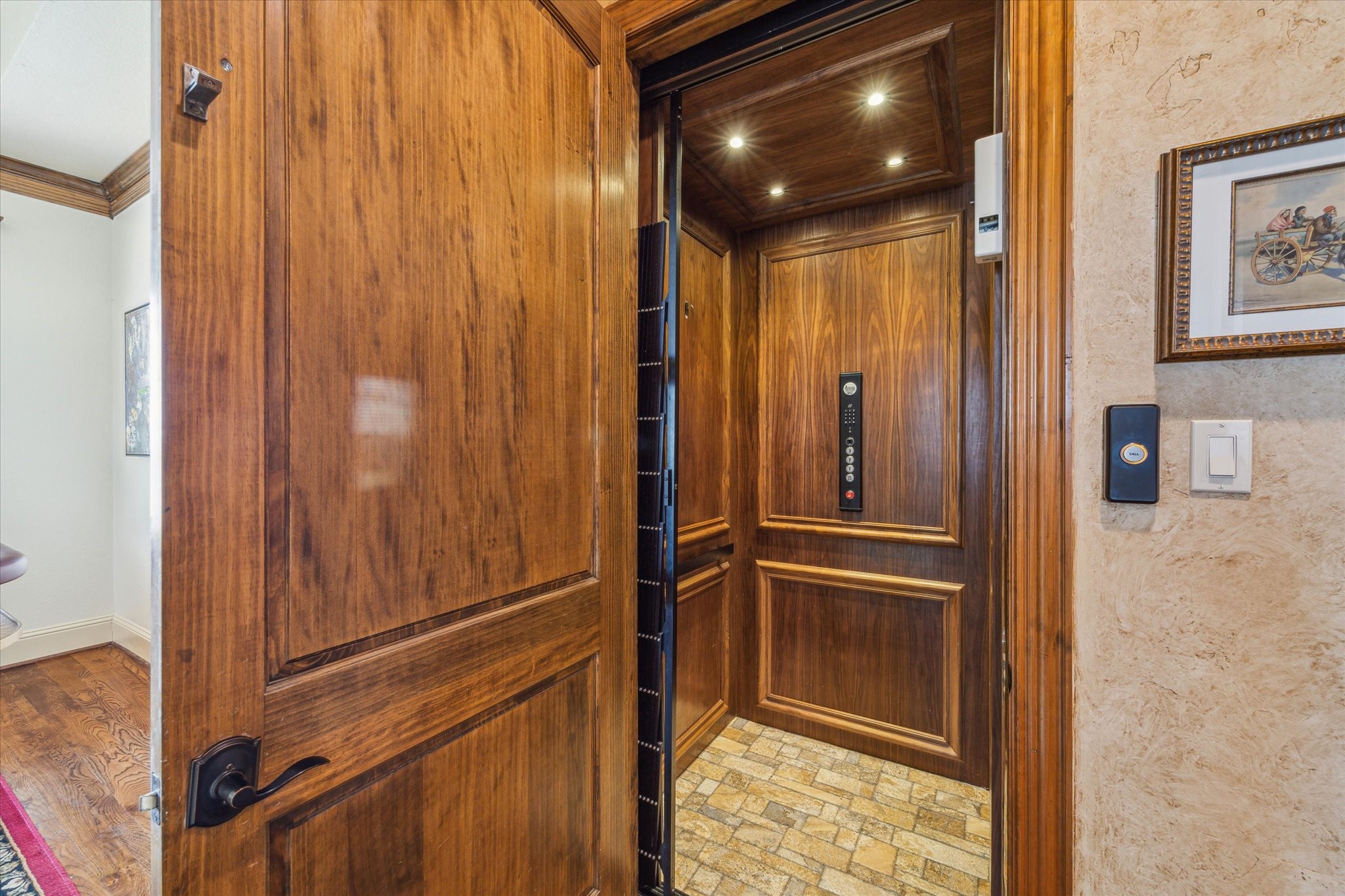 Residential elevator with 950 lbs. weight capacity servicing all three
levels for convenience. Handicap wheelchair ramps to ground level elevator access room and on main living level to the "Dice Room" access door
