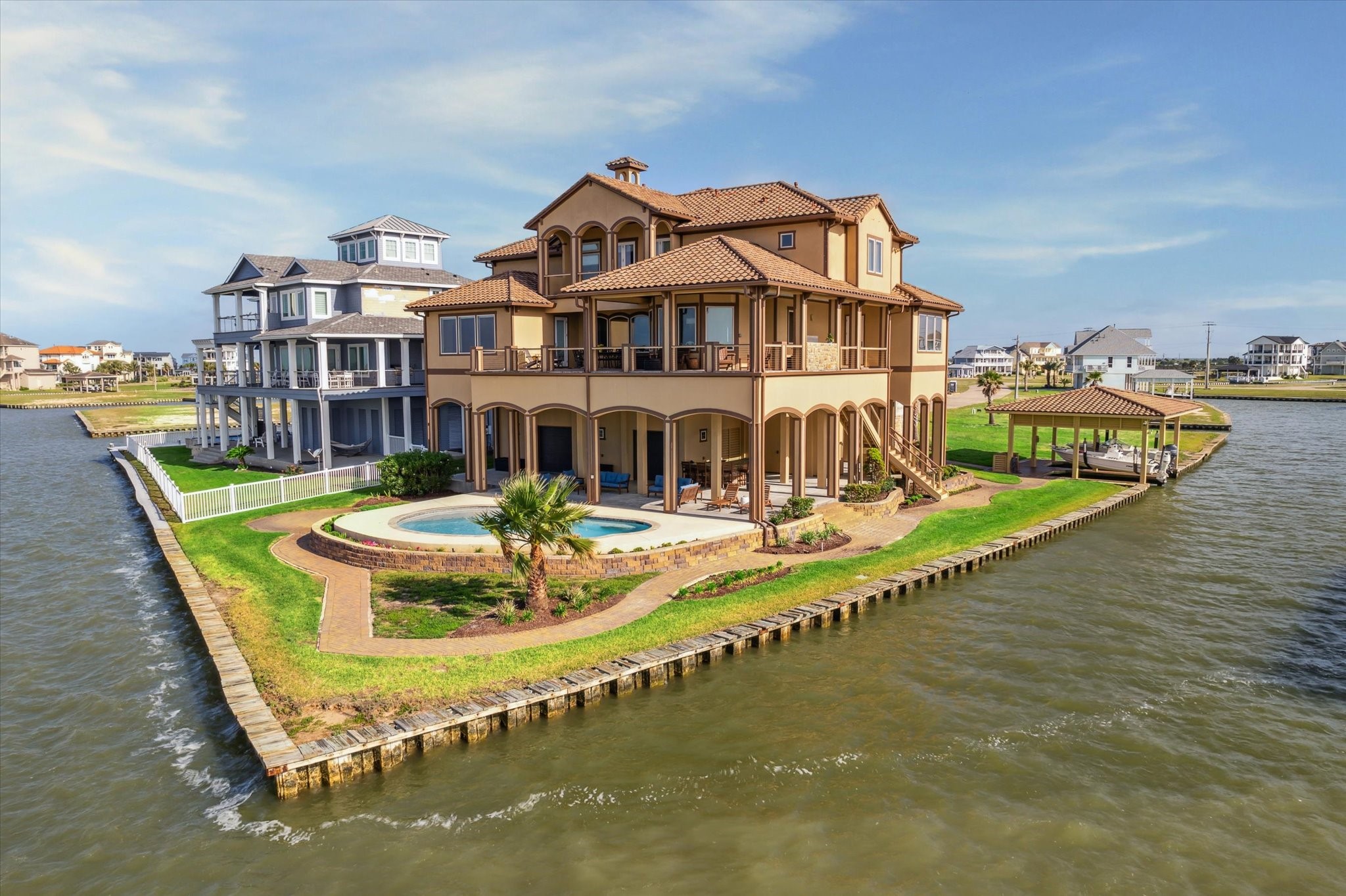 Homesite is one of the most desirable in Harborwalk; nearly 280 feet of
waterfront, including 85-foot frontage on West Galveston Bay; direct
access to ICW and unobstructed views of Galveston Island from
southern exposure