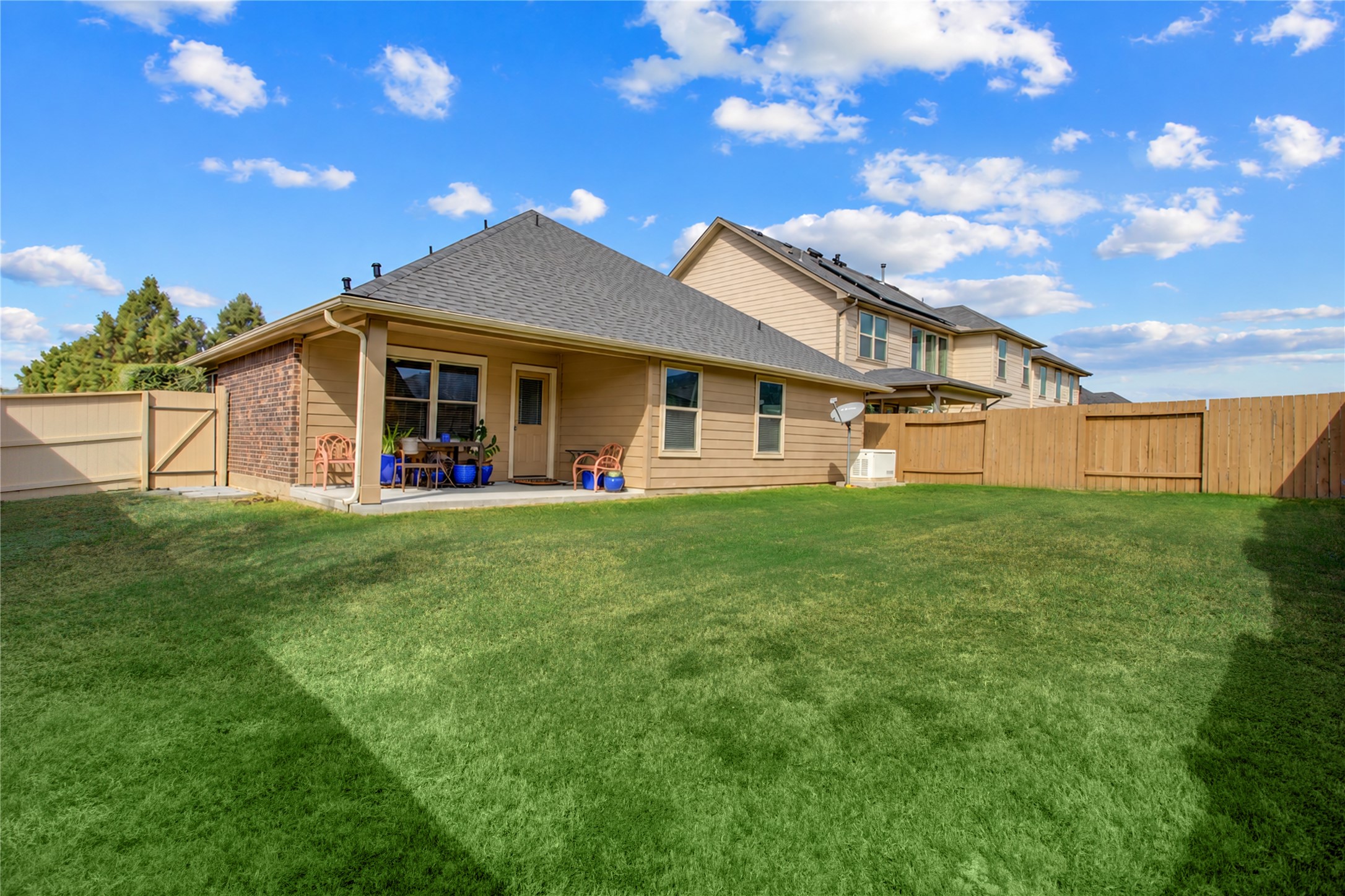 Step outside to your covered patio overlooking a spacious, fully fenced backyard perfect for relaxing, entertaining, and outdoor gatherings. Imagine weekend barbecues, outdoor dining, and evenings under the covered patio with plenty of backyard space to enjoy.