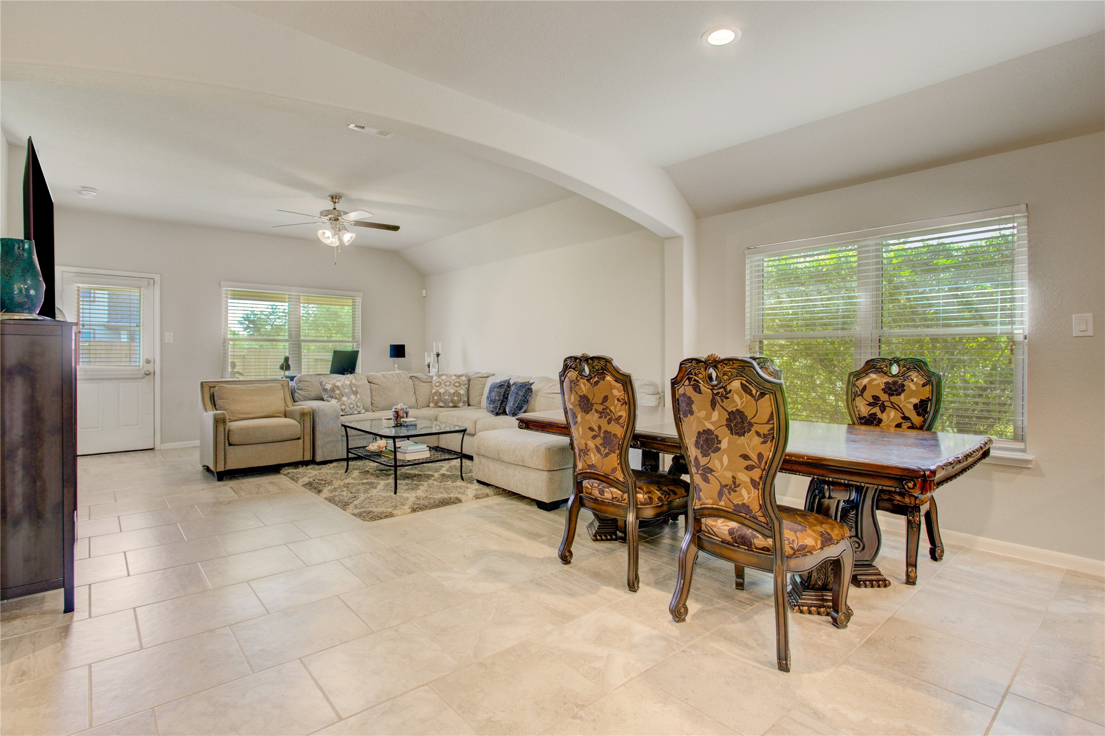 Host memorable dinners in the spacious dining area, seamlessly connected to the kitchen and living room.