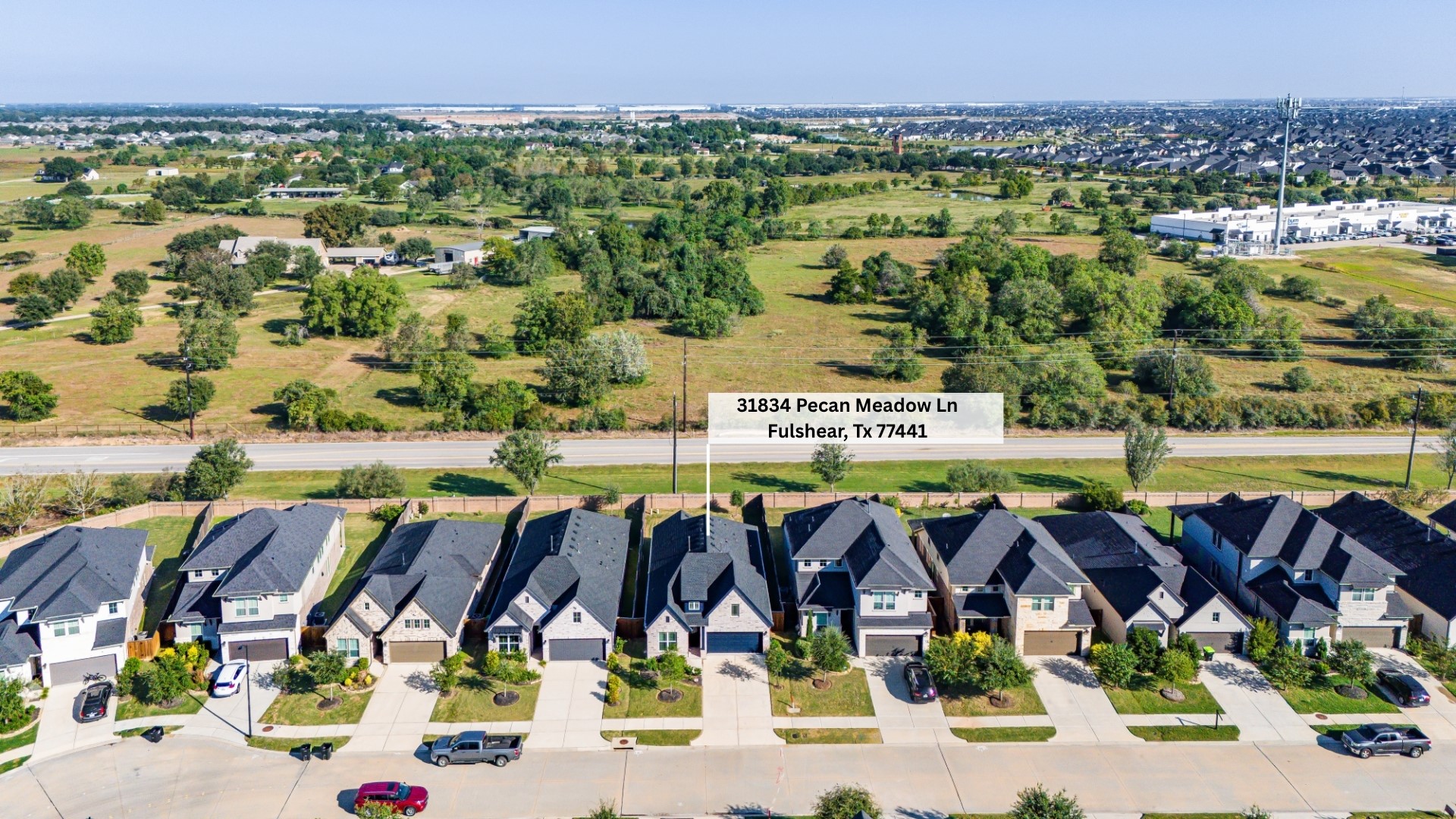 Gorgeous aerial view of 31834 Pecan Meadow Lane's lot placement in the Pecan Ridge community Gorgeous aerial view of 31834 Pecan Meadow Lane's lot placement in the Pecan Ridge community