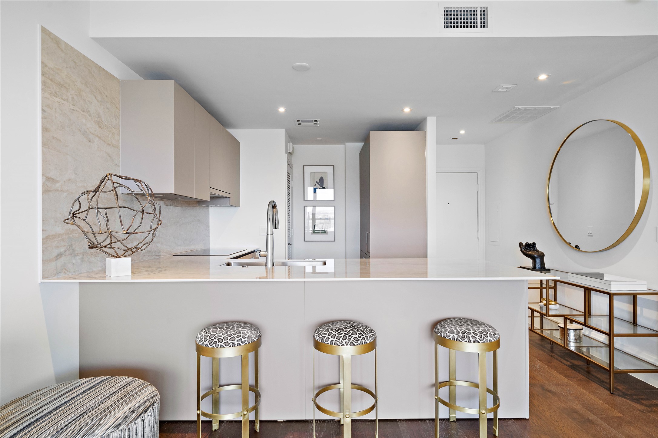Ample breakfast bar with seating for up to five.