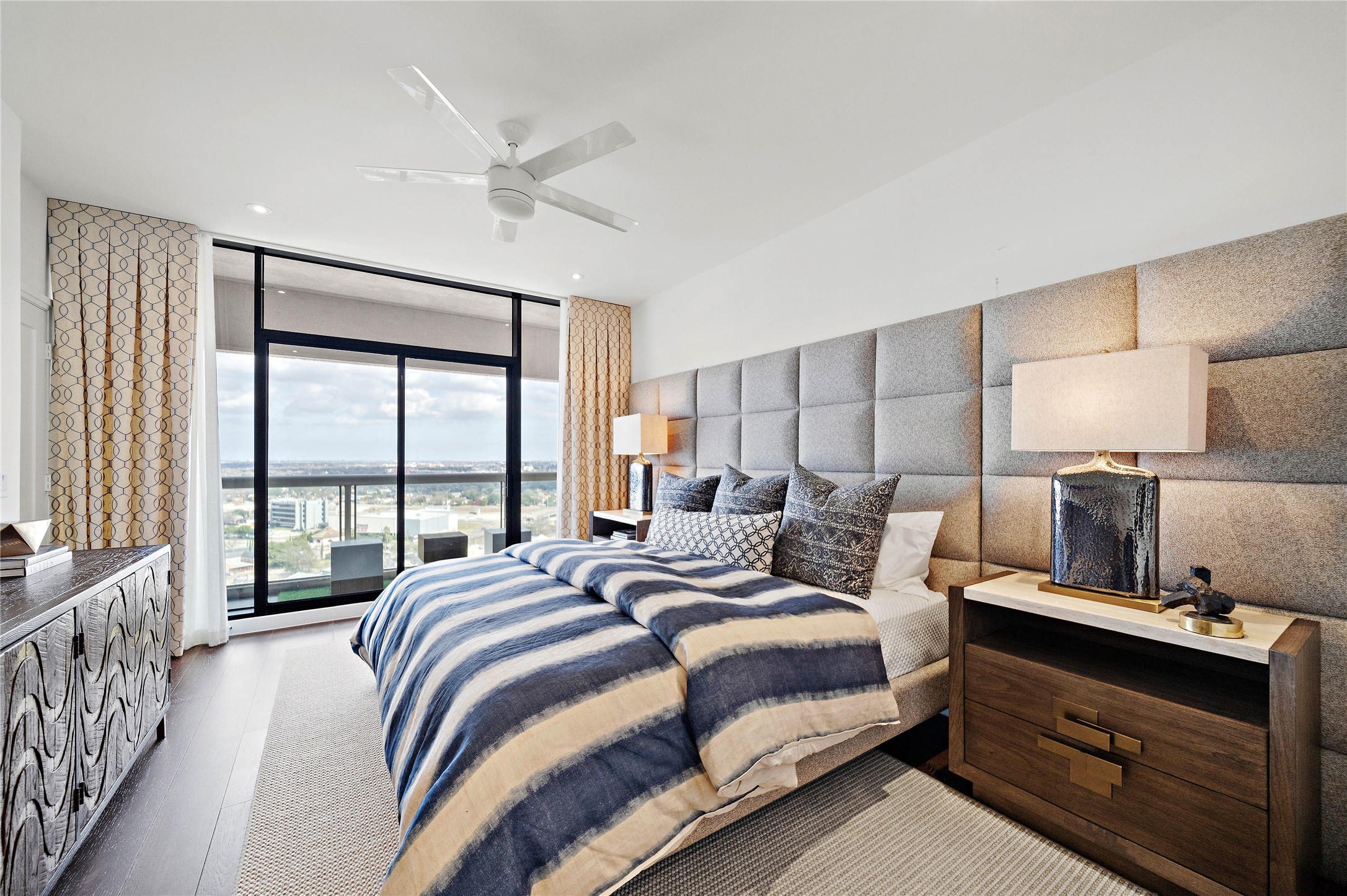 The large bedroom easily fits a king bed and has balcony access.