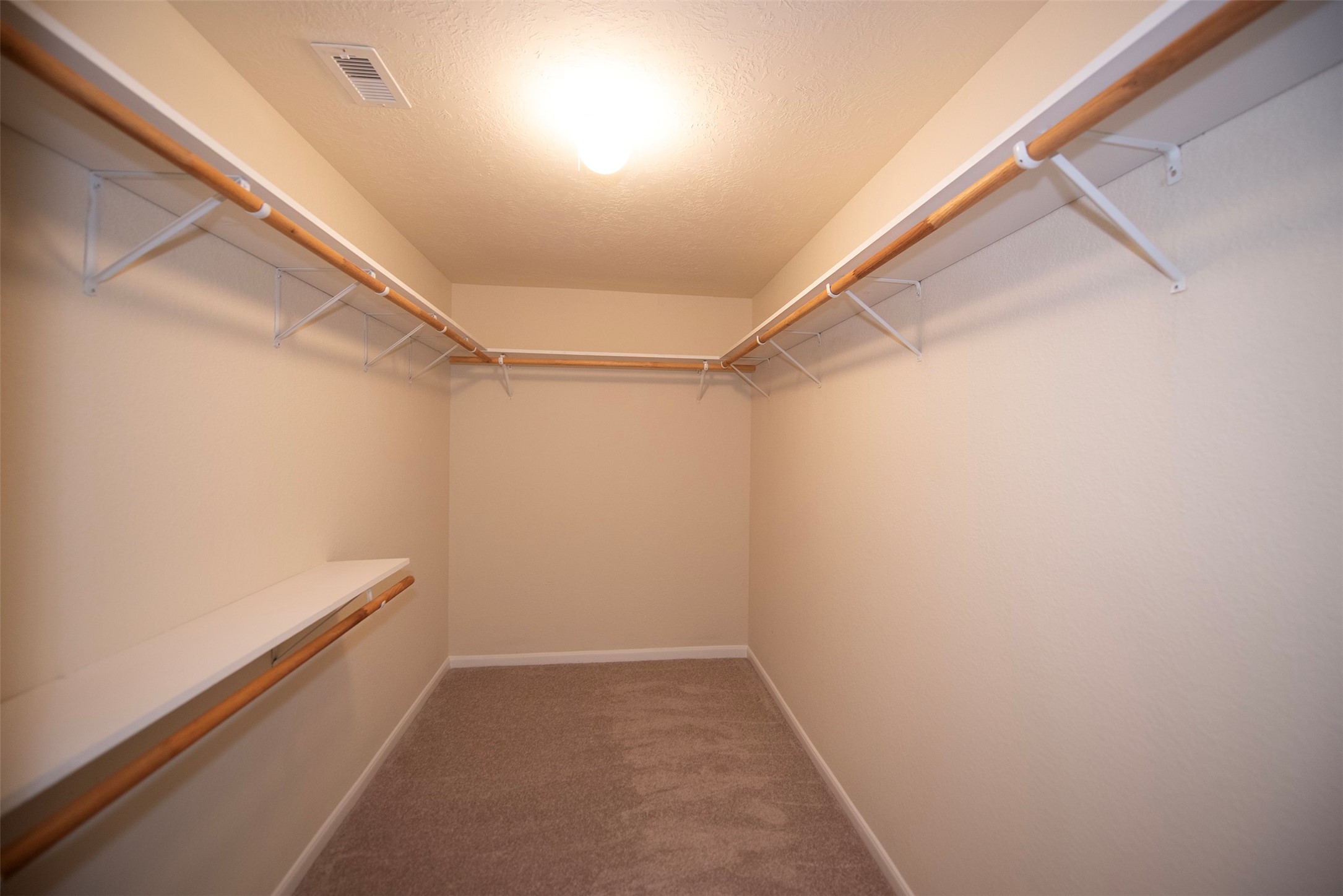 Huge walk in closet in master. Plenty of space for sharing.