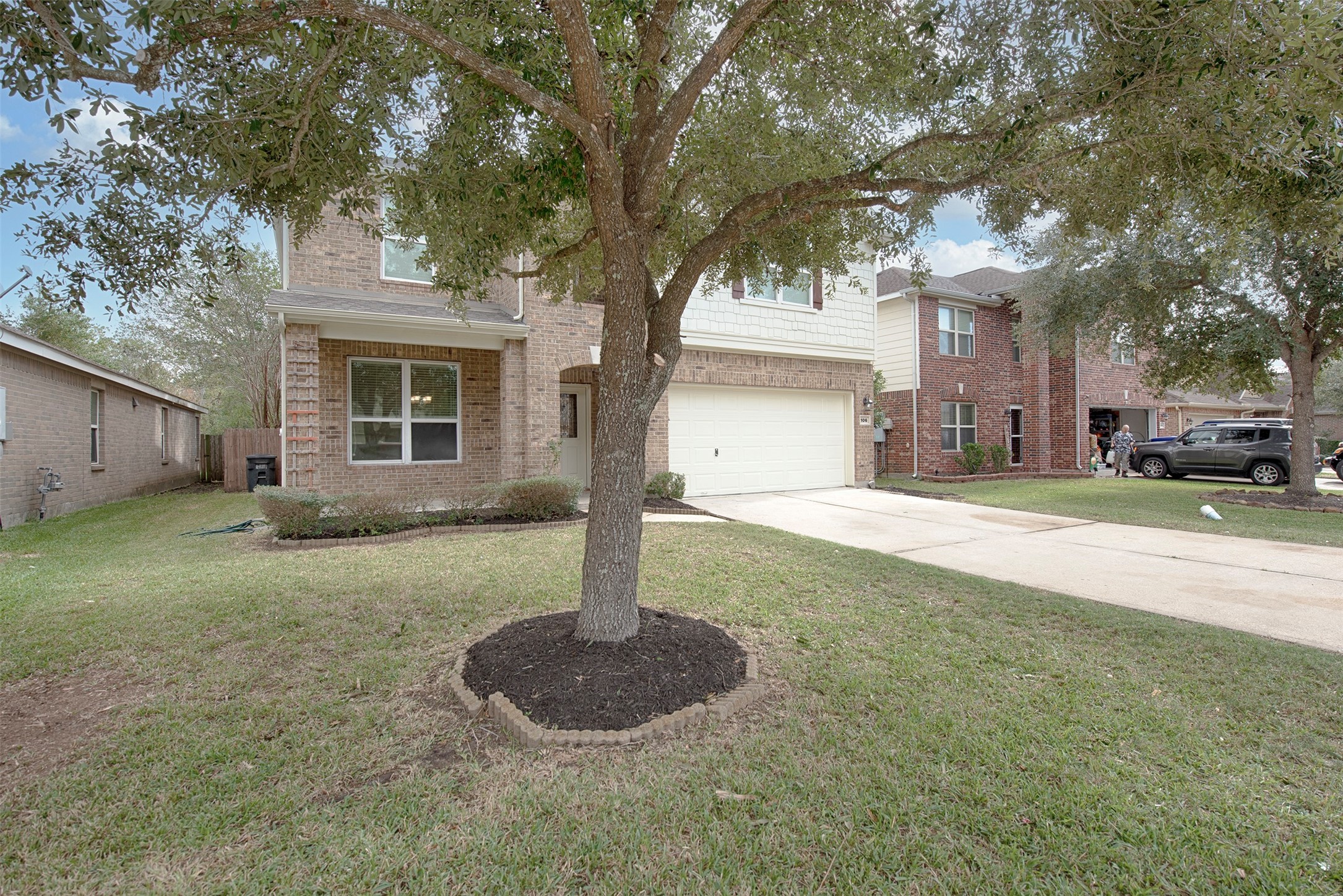Home has lovely curb appeal as well as terrific additional parking for your guests and brick lined garden.