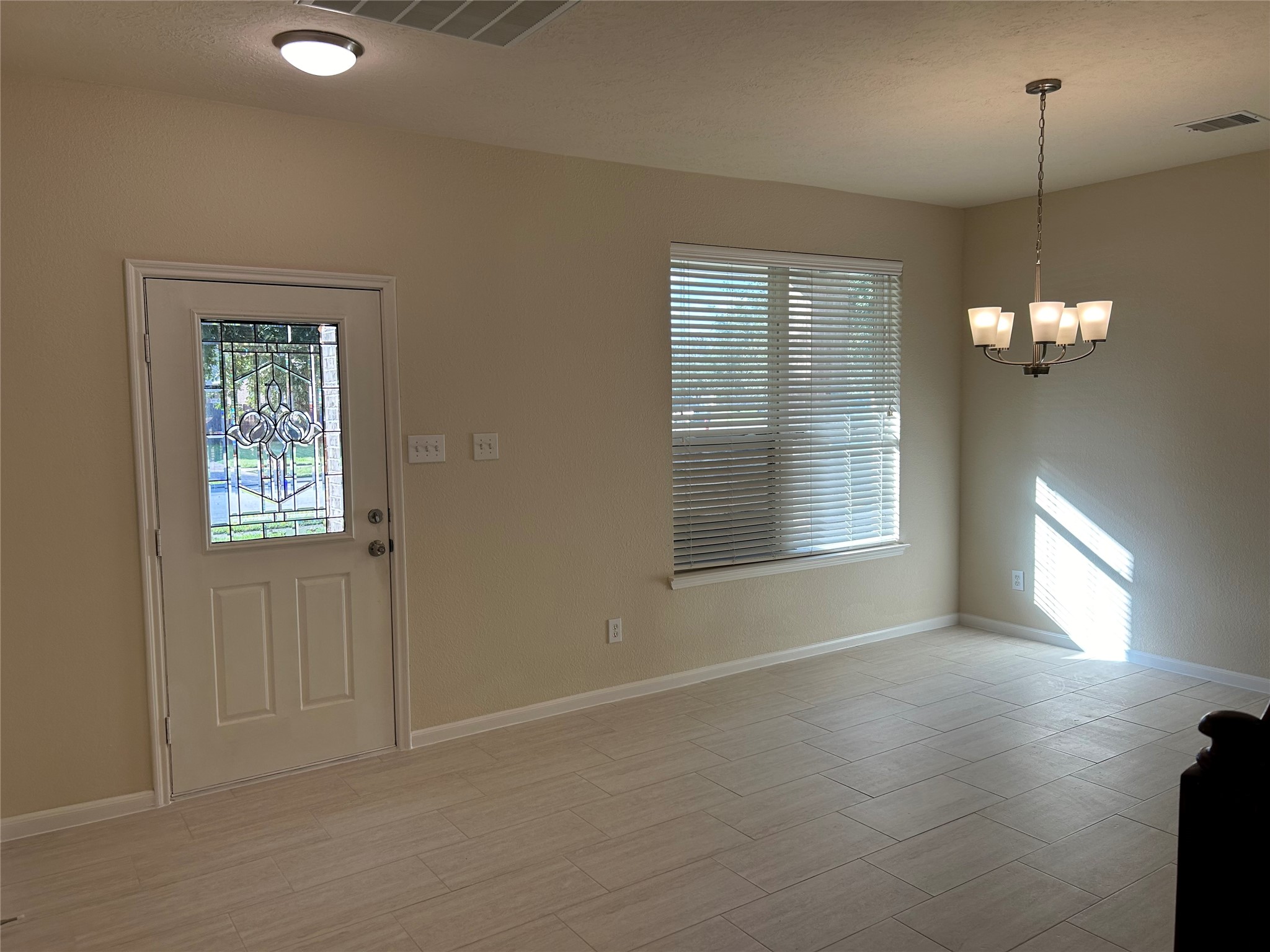 Entry to the home you are greeted by a fabulous dining area.