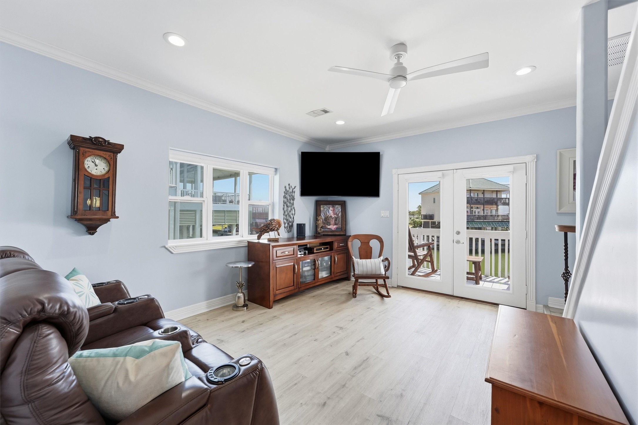 Separate guest living area offers additional space to relax with direct access to an outdoor deck.