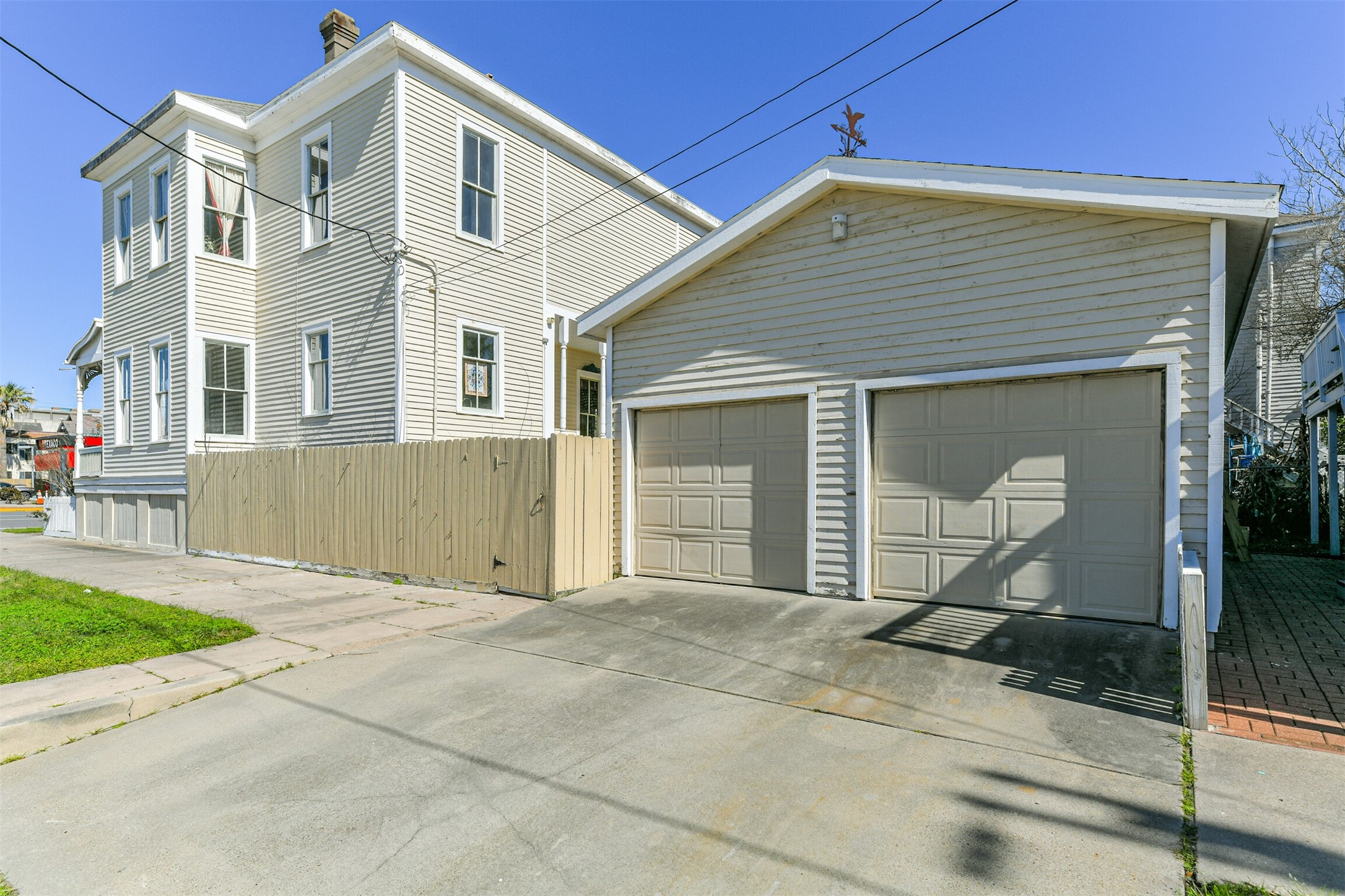 Parking can be difficult in the historic district, but not for this home!  It features a two-car detached garage with a double-wide concrete driveway that provides even more off-street parking space.