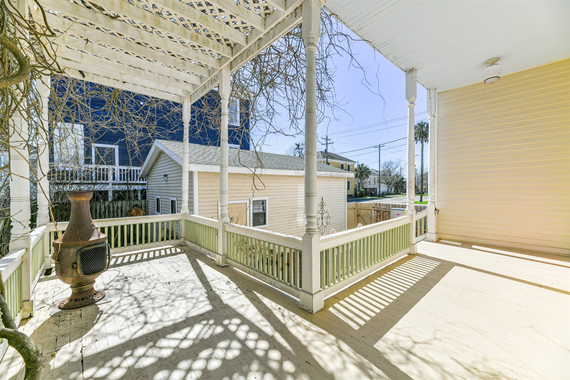Step out the back door to this L-shaped veranda that's the perfect spot to enjoy your morning coffee or an evening cocktail while the salty sea breeze dances around.