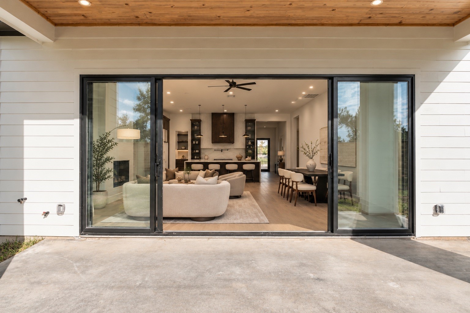 The covered patio extends the living experience outdoors, complete with a gas connection and pre-wiring for speakers for effortless entertaining year-round.