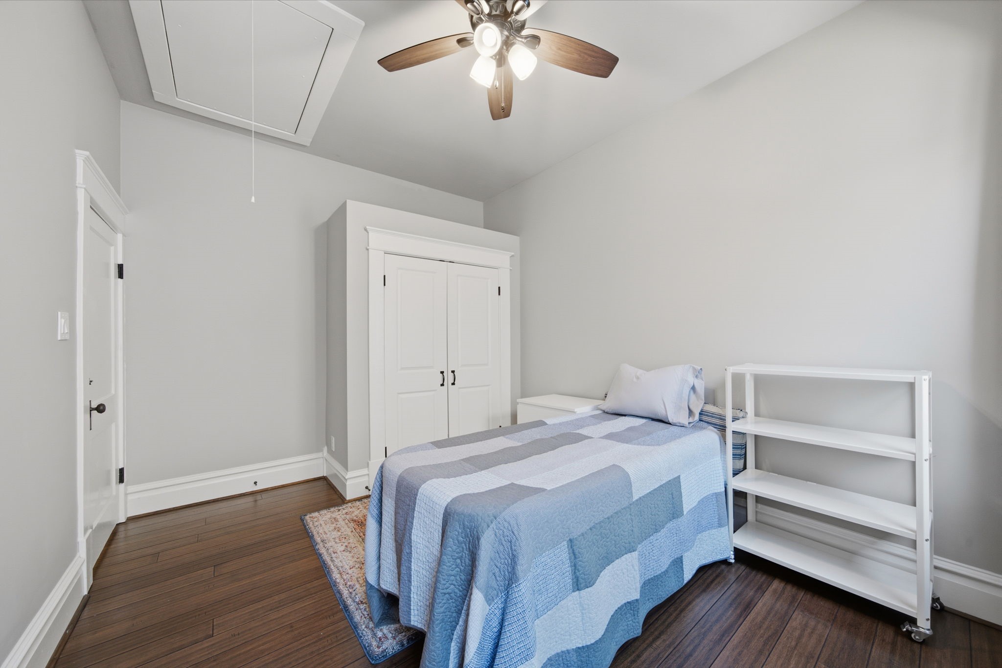 Another view of this guest bedroom (of 3). Double door closet for plenty of STORAGE! Attic access is in this room - for additional storage space!