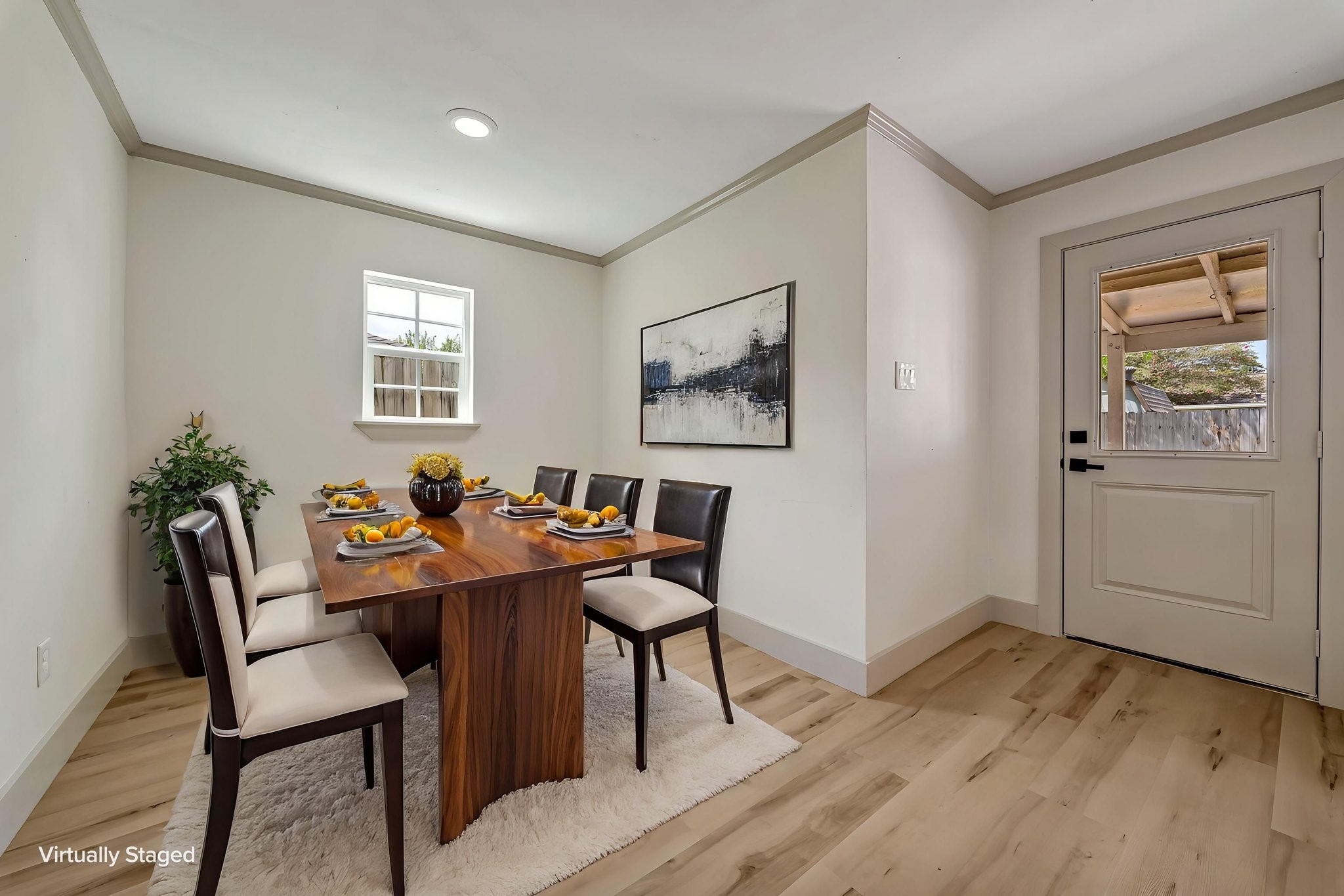 (Photoshopped) Bright and inviting dining area providing a perfect setting for gatherings.