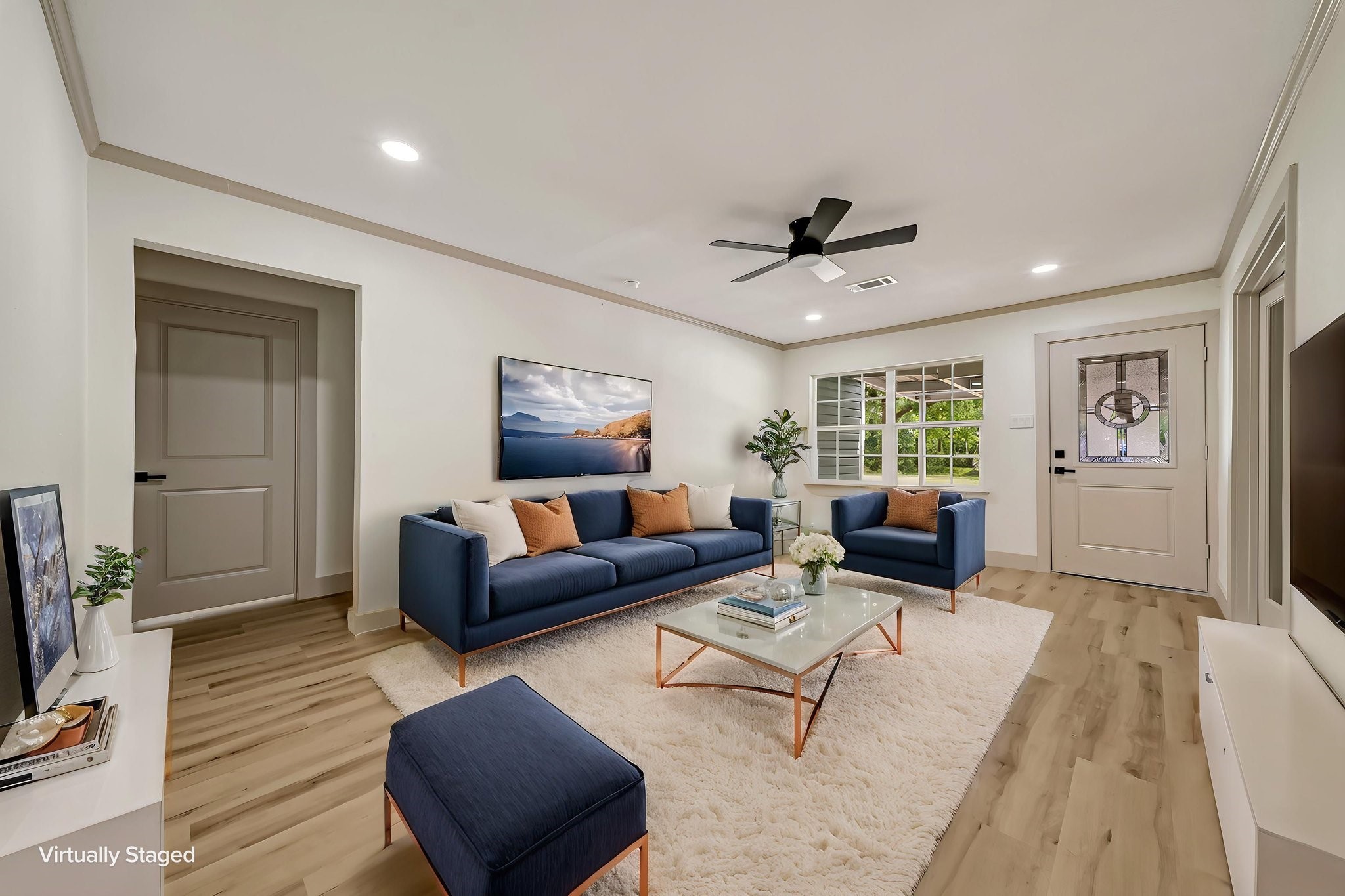 (Photoshopped) Step into a bright, inviting living space featuring sleek, modern furnishings and a cozy atmosphere, enhanced by virtual staging for an inspiring vision of your future home.