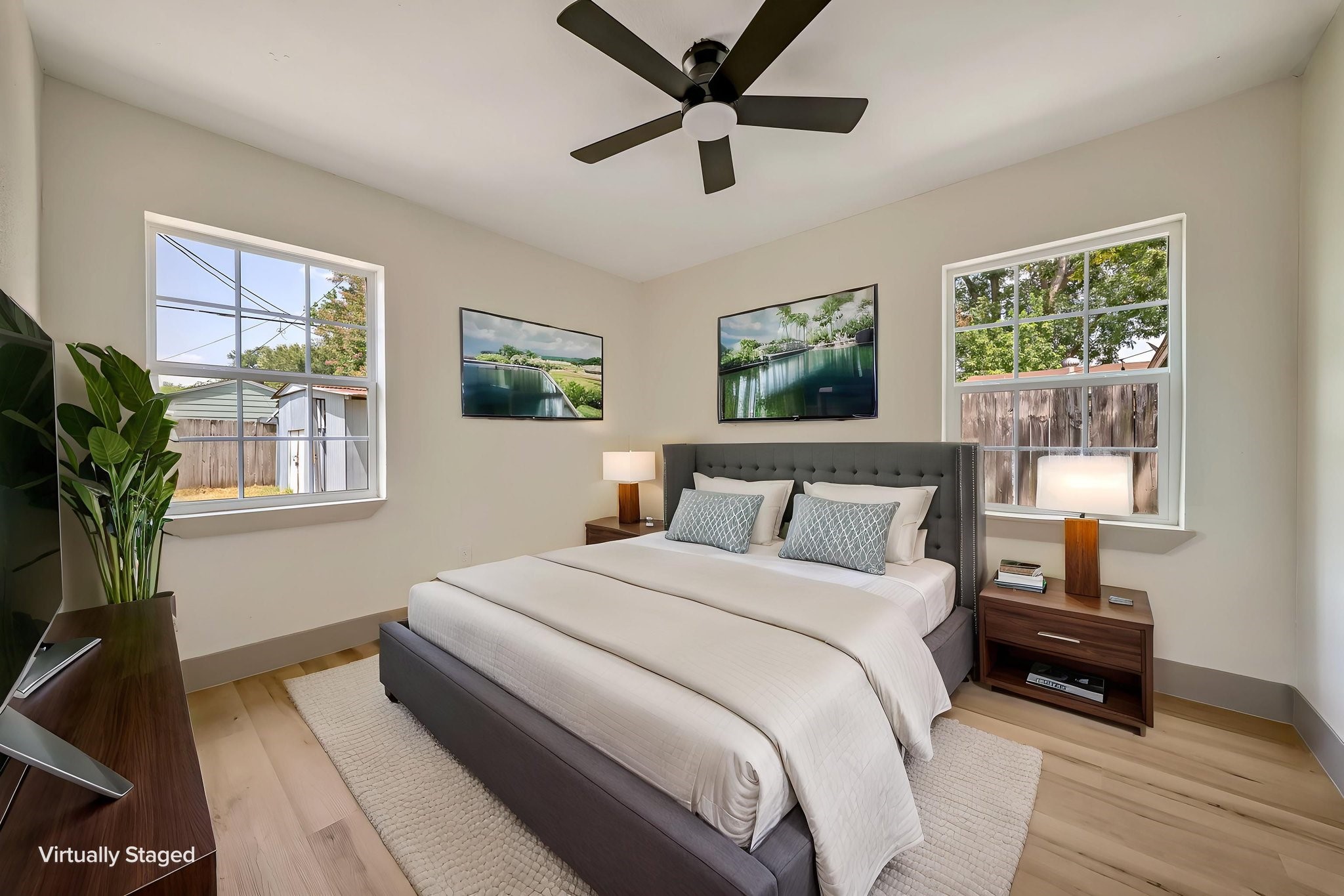 (Photoshopped) Charming and serene, this light-filled bedroom offers a stylish retreat with its modern furnishings and tranquil ambiance, perfect for relaxation. (Photoshopped) Charming and serene, this light-filled bedroom offers a stylish retreat with its modern furnishings and tranquil ambiance, perfect for relaxation.