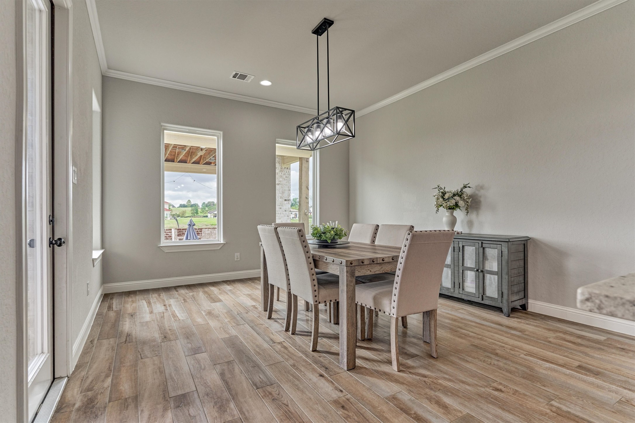 Dining area off of the kitchen with access to the backyard.