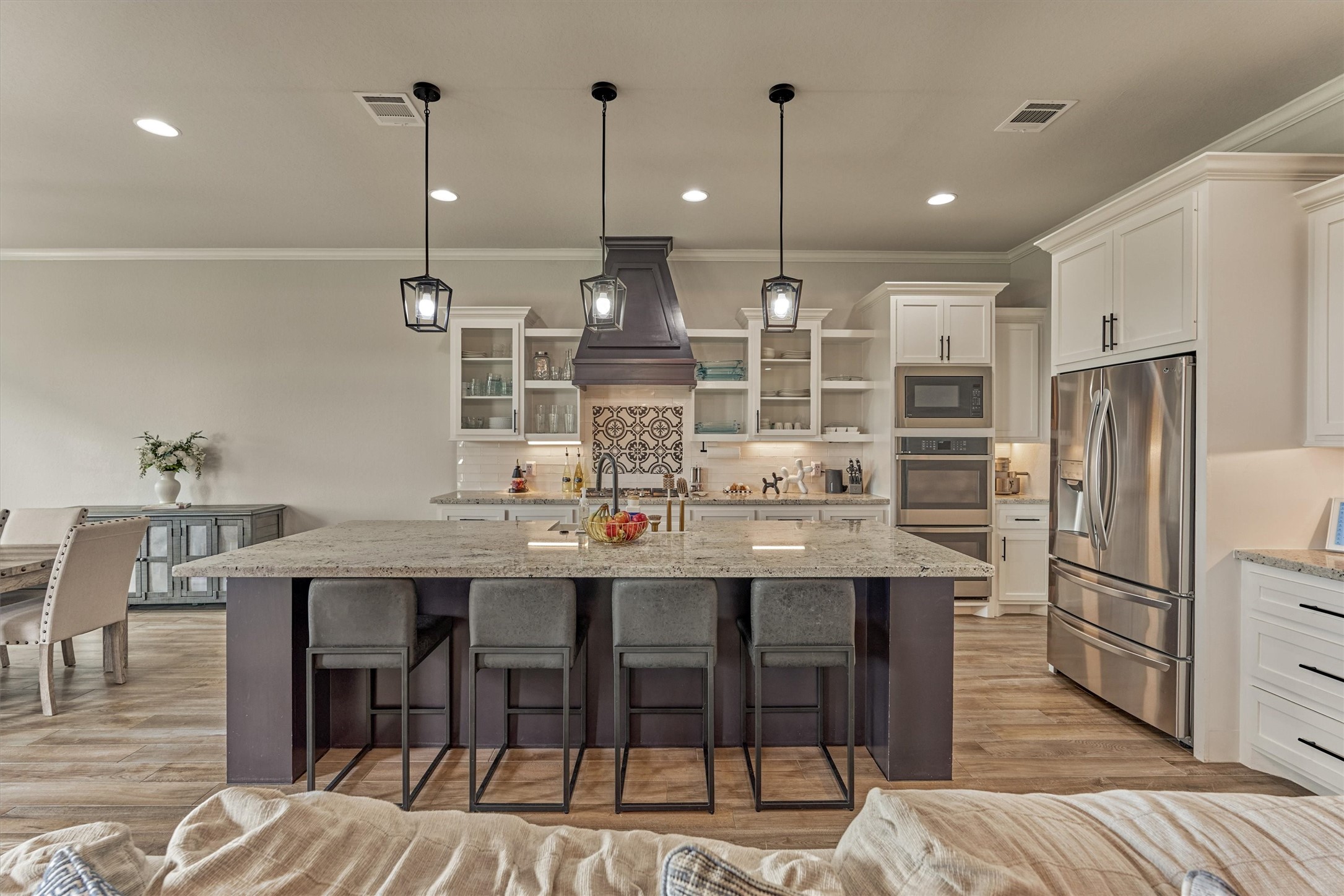 Custom cabinetry, and double ovens are a must!