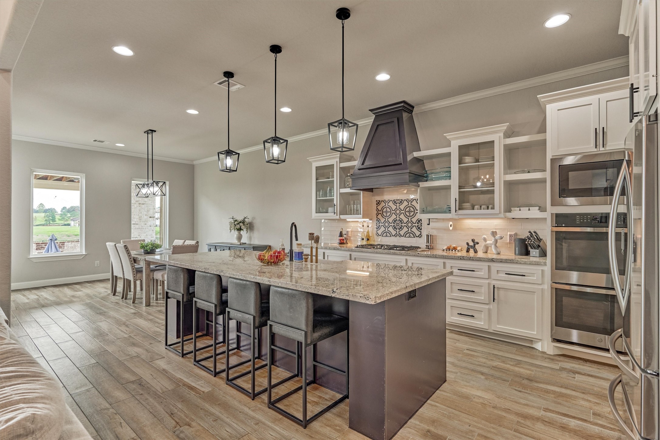 The kitchen features island seating and plenty of counter space for entertaining and every day use.