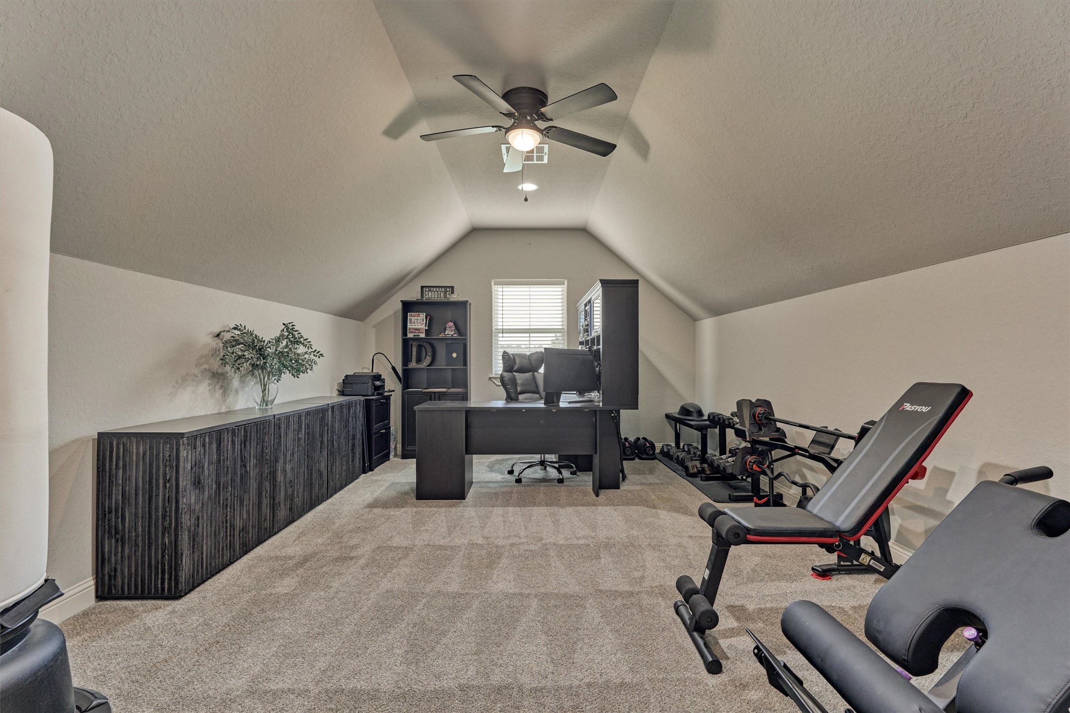 Upstairs features a large flex space which could be used as an office, gym, playroom, theater, etc.