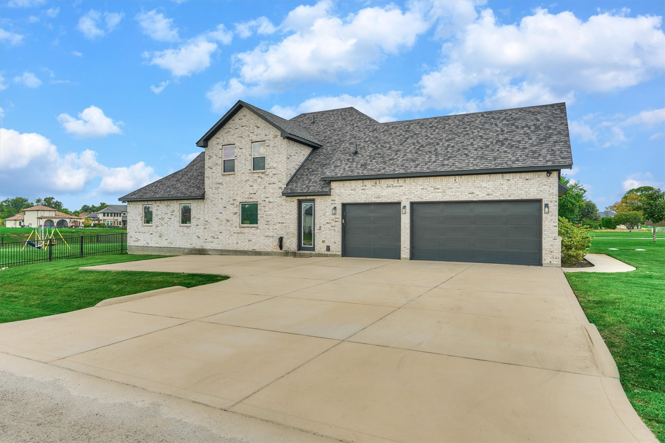 Extra parking space and 3 car garage and entryway into the mudroom.